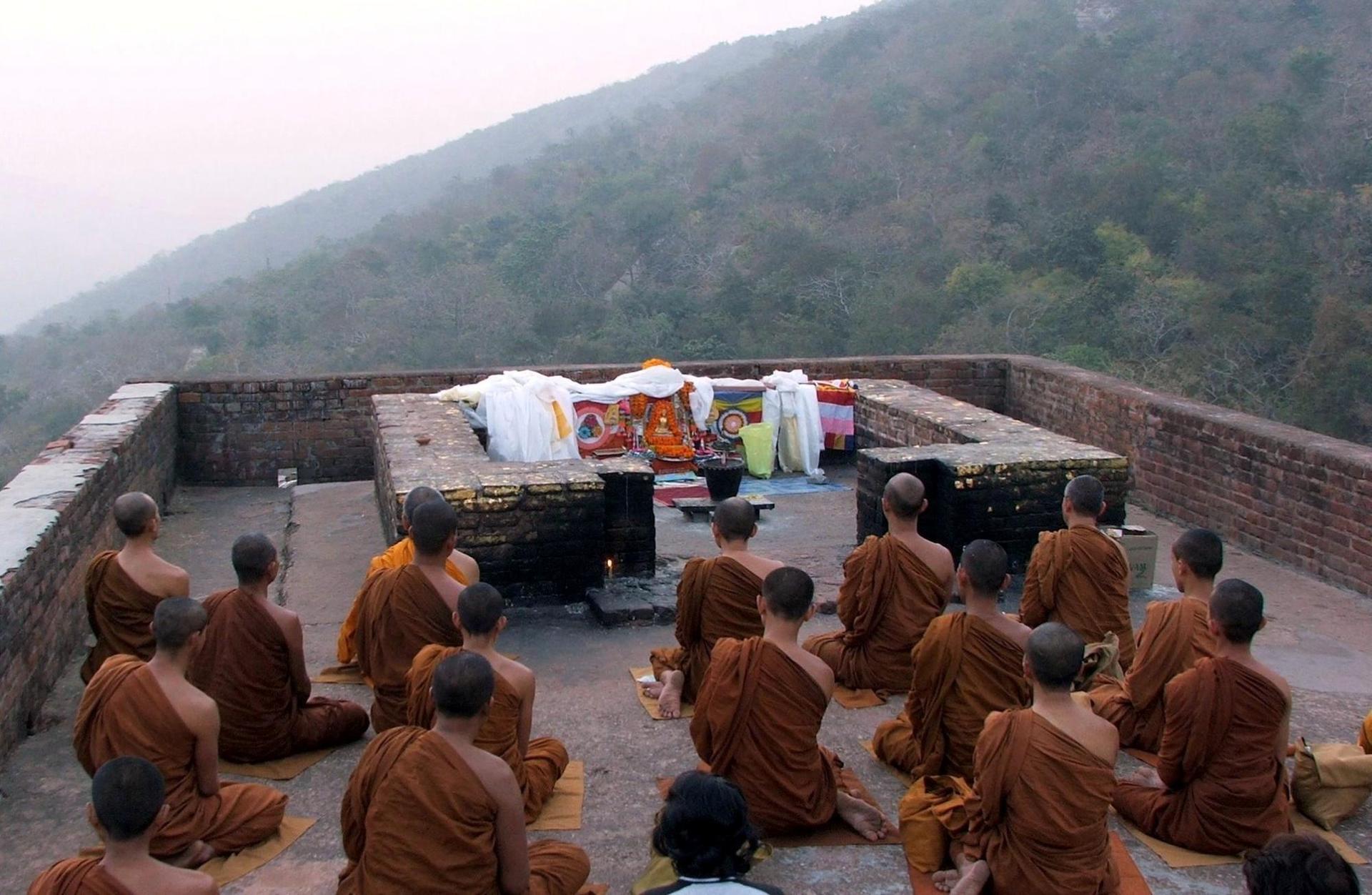 Buddhist monks meditating on Vulture Peak
