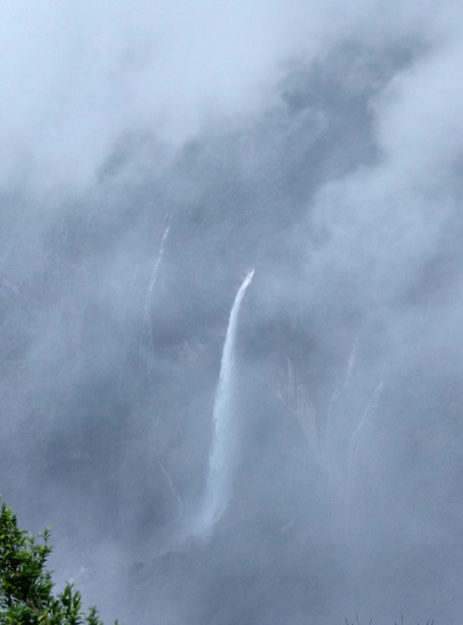 Nohkalikai Fall is covered in fog