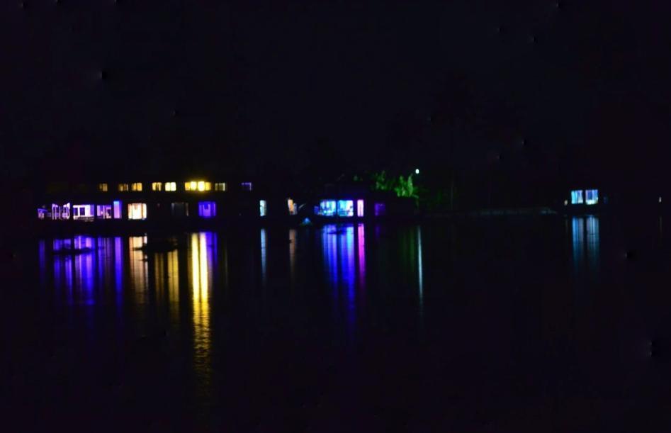 Softly lit houseboats