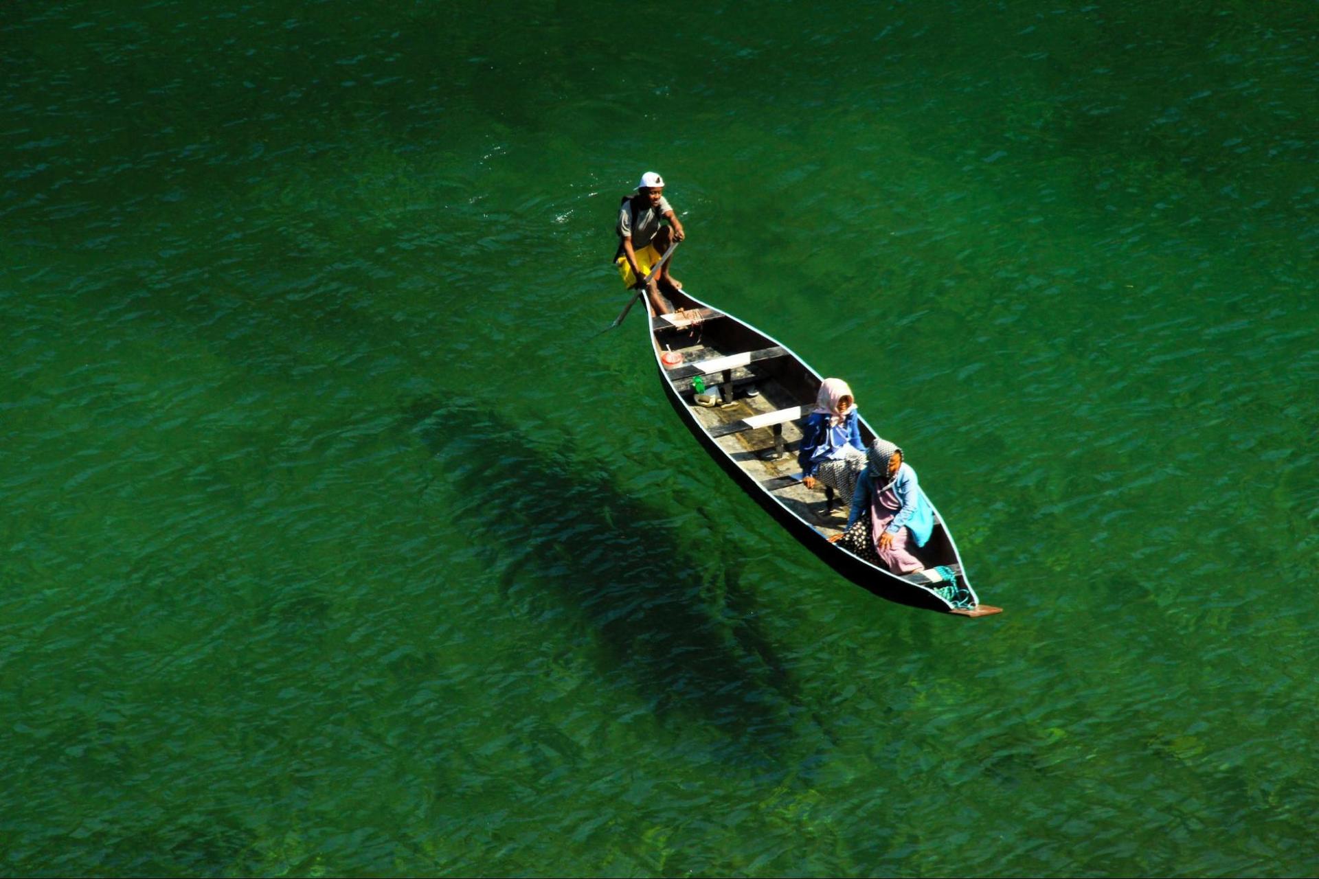 The crystal clear green waters of the Umngot River