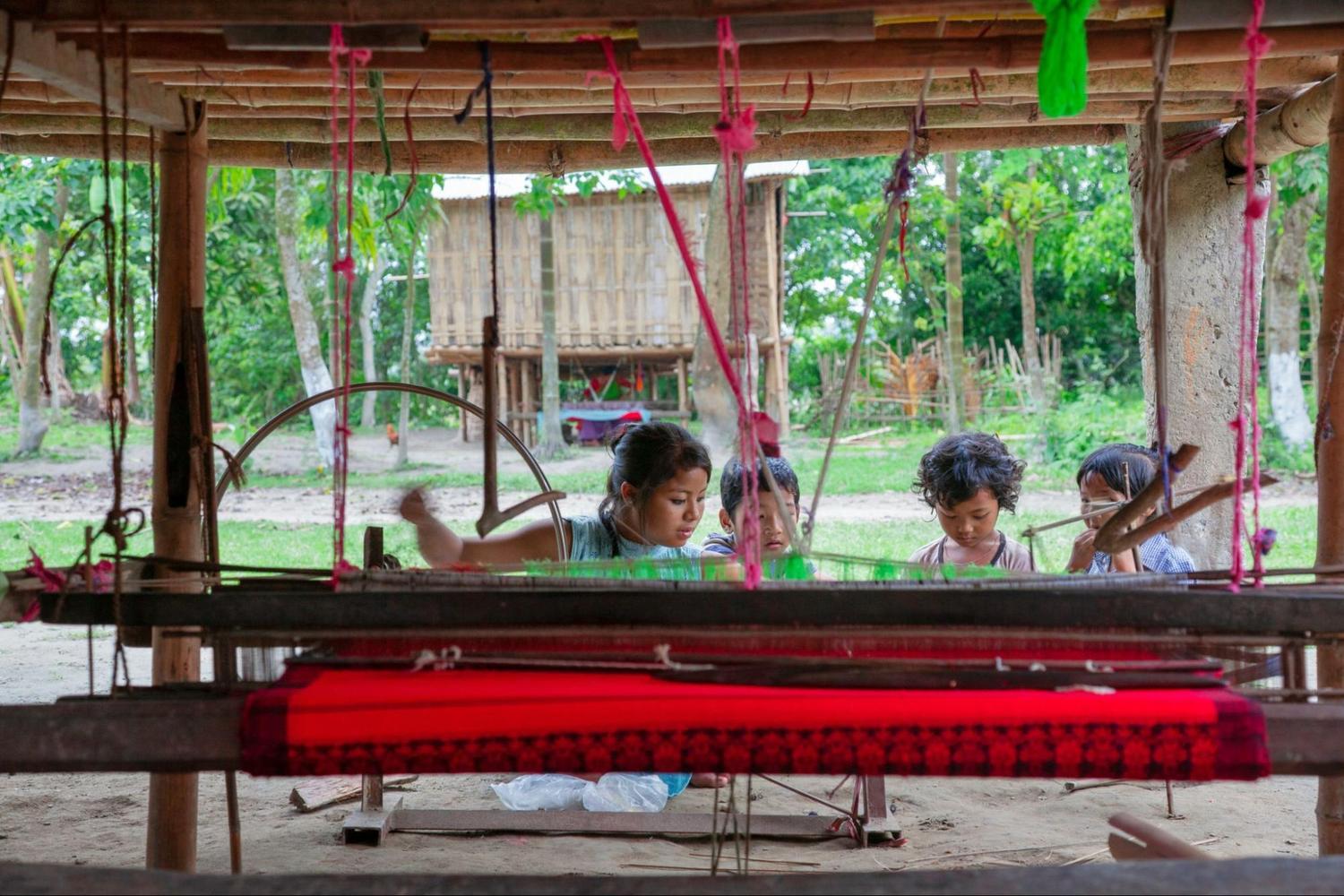 The Mising Tribe women weaving cloth