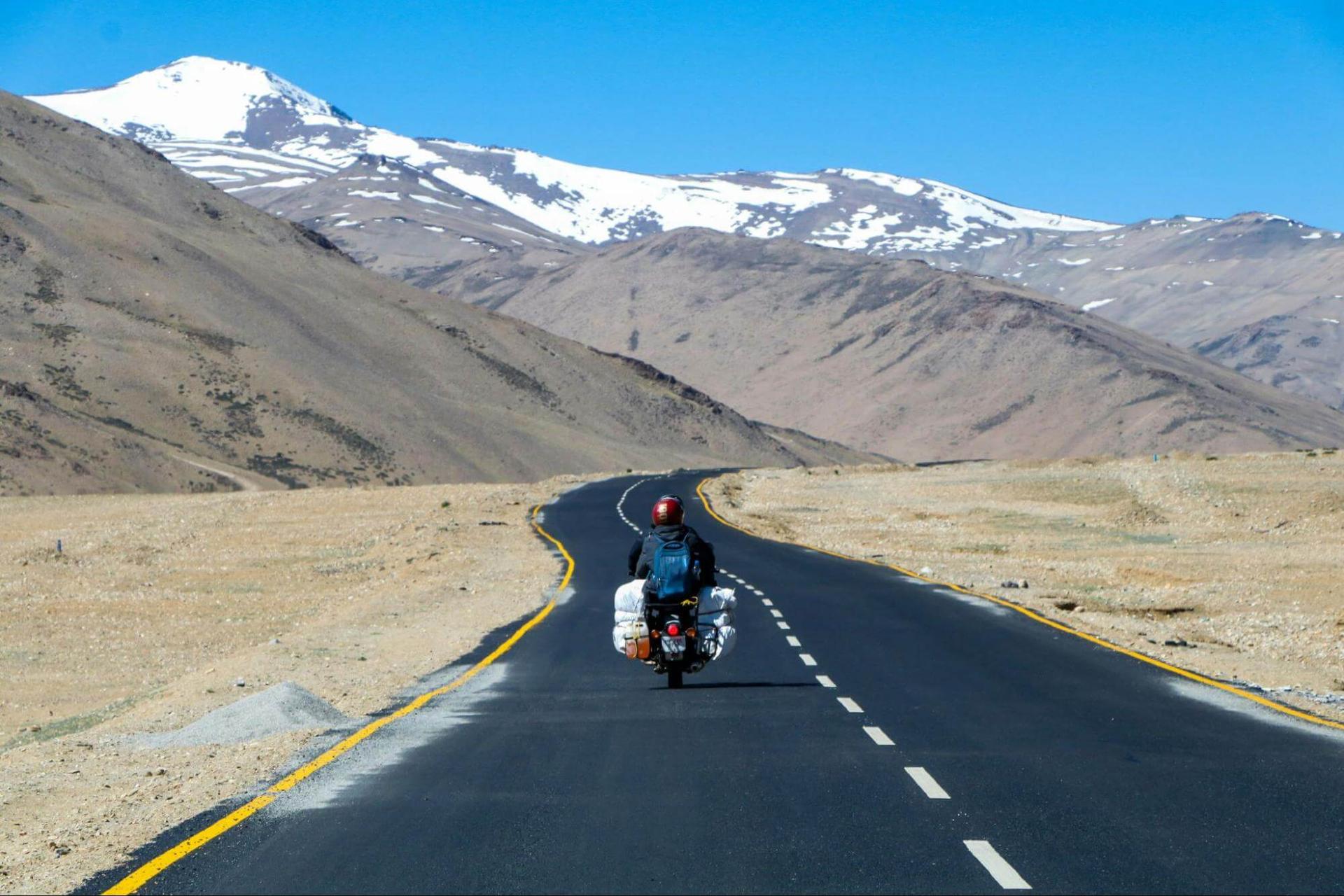 Road in Ladakh with snowy peaks