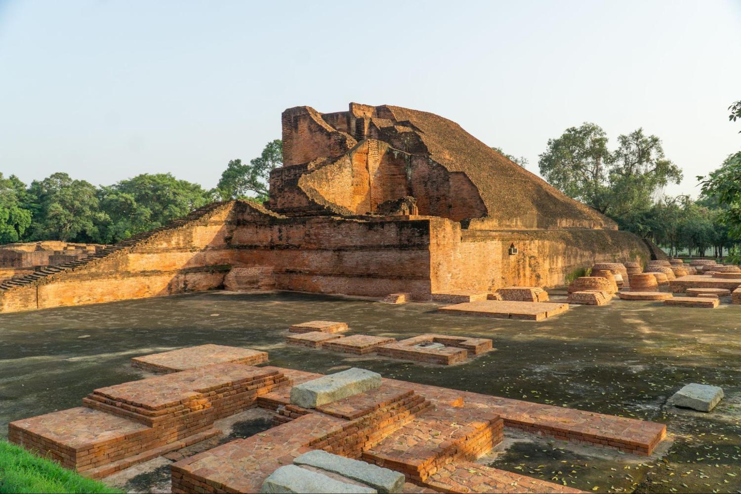 Broken Sariputta Stupa with burn marks