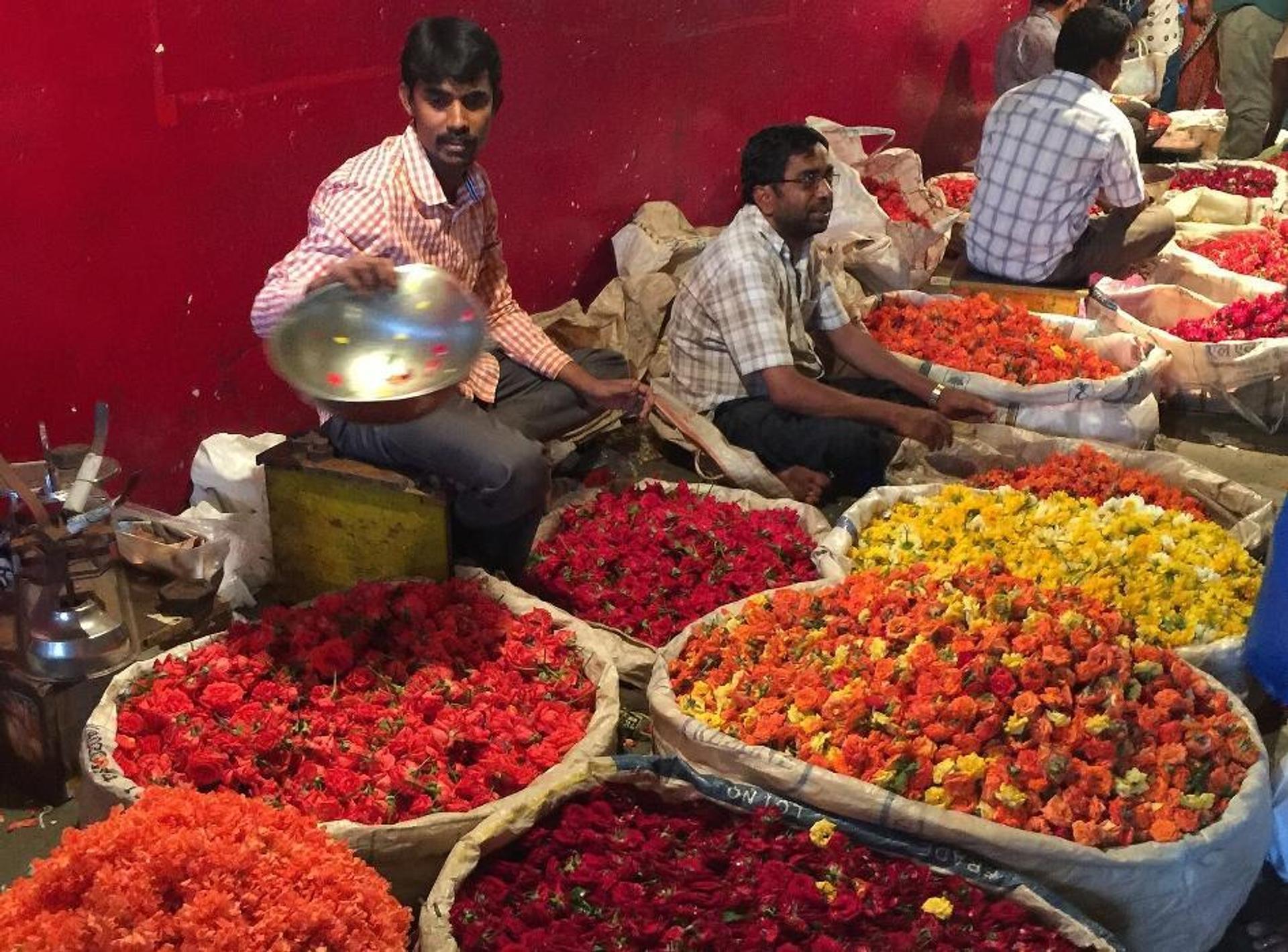 Vendors selling flowers