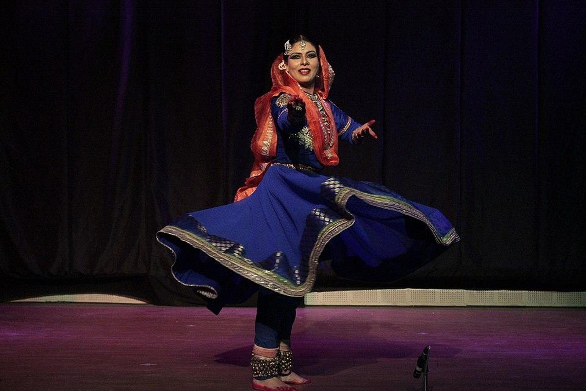 Beautiful Kathak Dancer in an elegant attire and refined poses