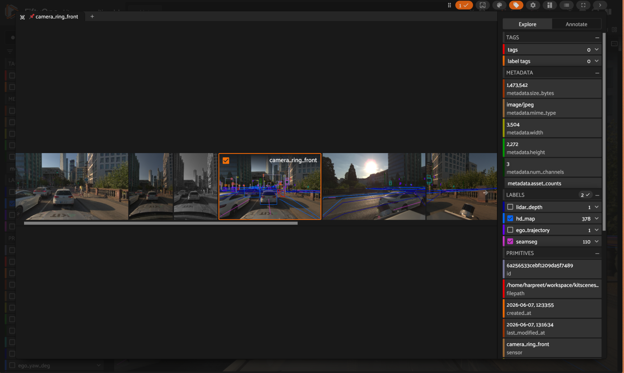 Six camera views of a Frankfurt street with HD-map polylines overlaid (road border, curbstone, drivable area, dashed/solid/virtual lane lines, centerlines, crosswalks, stop lines) and a legend of the Lanelet2 style categories.