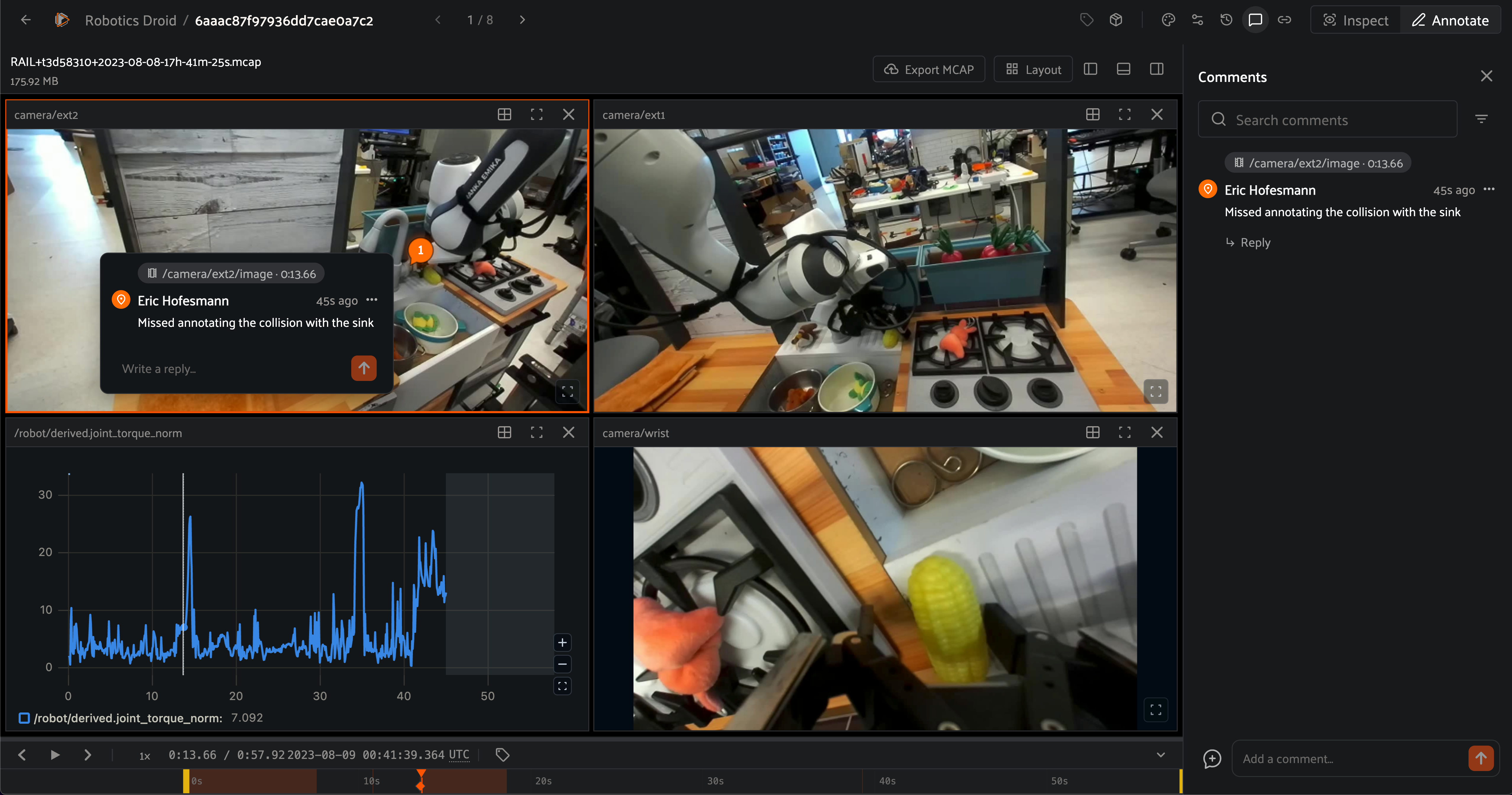 Robotics data viewer showing four synced panels — two robot arm camera views, a wrist camera close-up, and a joint torque graph — with a spatiotemporal comment thread noting a missed collision annotation with the sink.