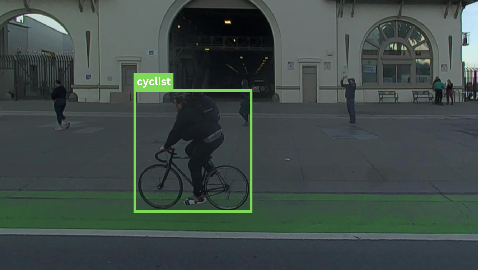 bounding box and cyclist label around a cyclist riding at dusk, annotated in Voxel51