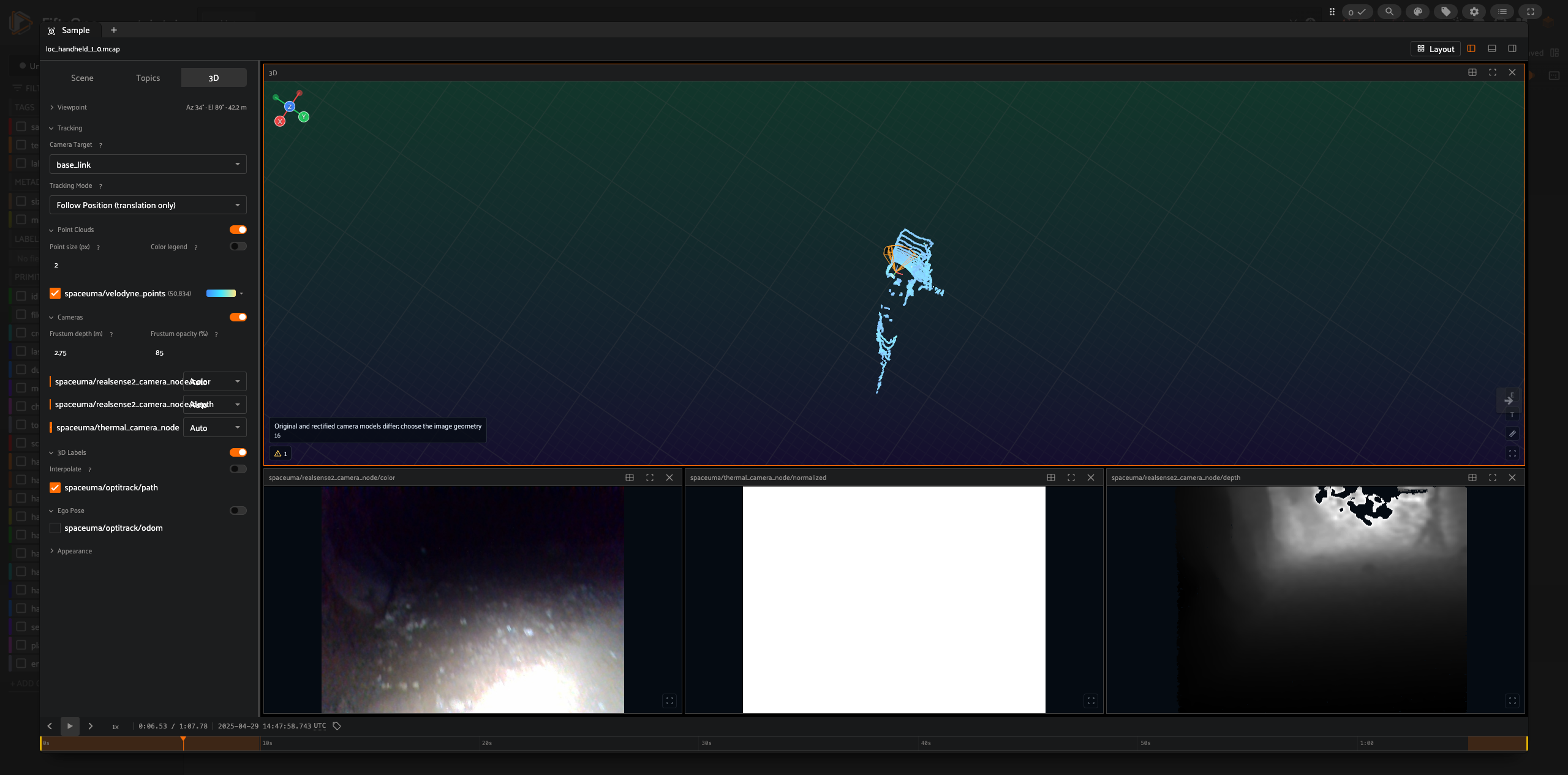 Orange ground truth trajectory authored as a native MCAP channel, rendered as a growing line in FiftyOne's 3D viewer during playback.