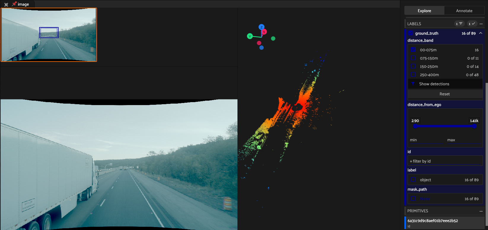 FiftyOne grouped sample joining a TruckDrive camera image with its FMCW LiDAR point cloud, colored by distance from the truck.