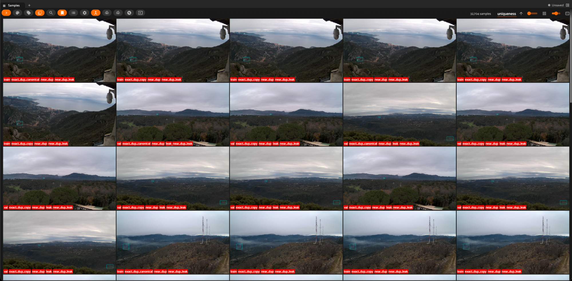 FiftyOne App grid view of fifteen visually similar Pyro-SDIS frames from fixed wildfire cameras, flagged as near-duplicates using FiftyOne Brain embedding analysis, illustrating the dataset's heavy fixed-camera redundancy.