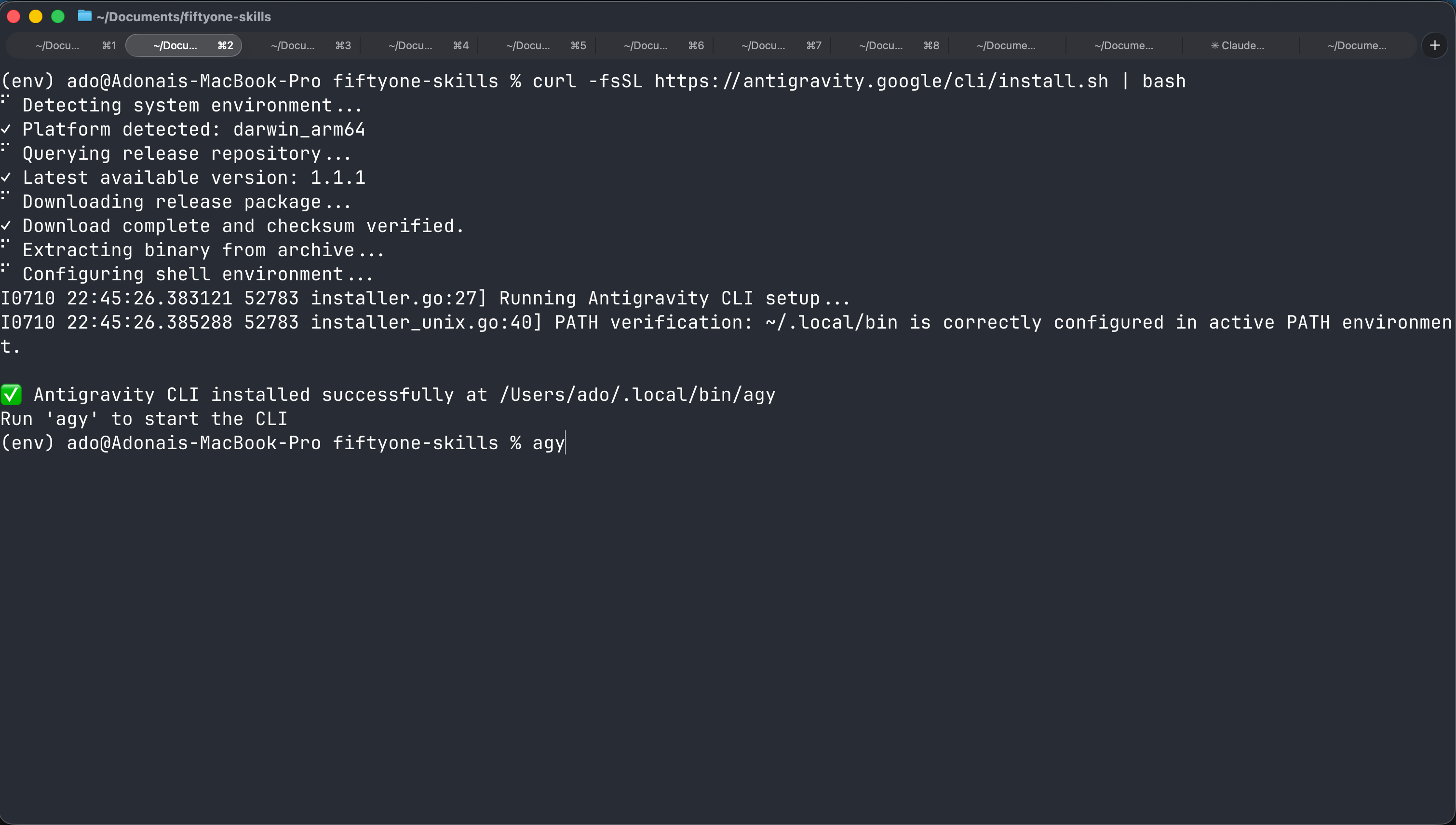 Terminal running the Antigravity CLI install script and installing version 1.1.1.