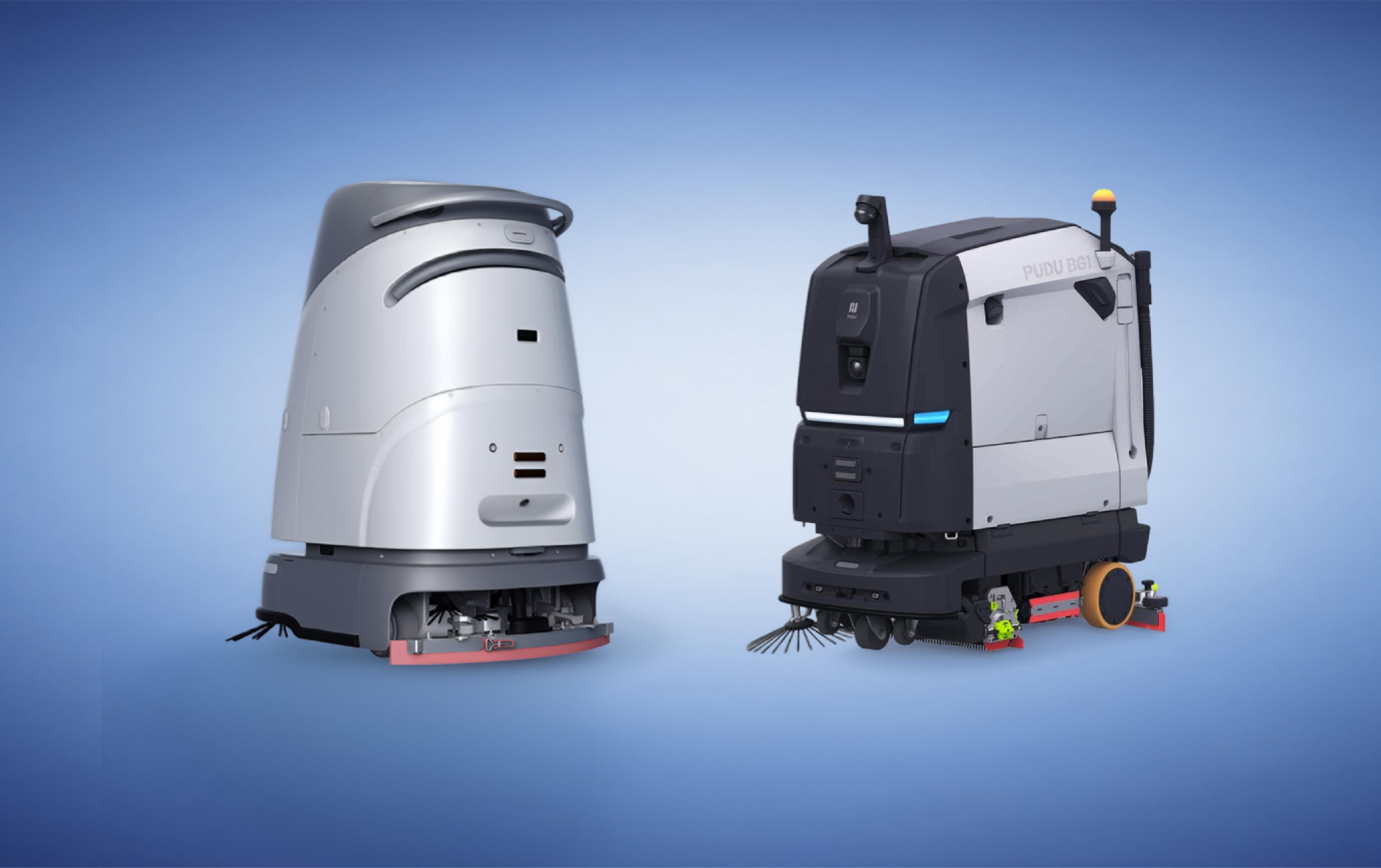 Side-by-side comparison of two commercial cleaning robots on a blue background: VIGGO's compact silver SC50 Pro Plus scrubber on the left, and Pudu Robotics' larger black-and-white BG1 sweeper-scrubber on the right.