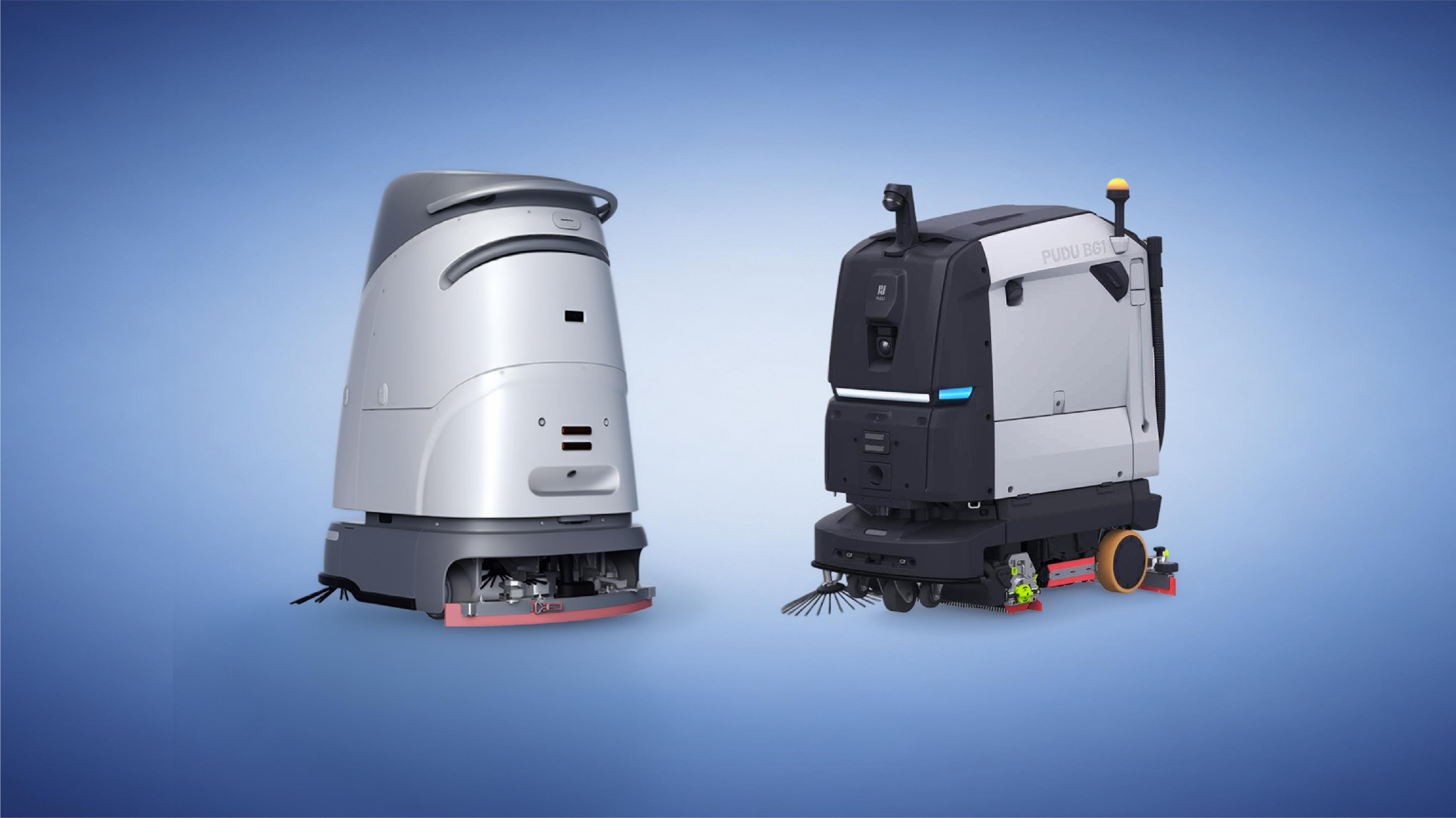 Side-by-side comparison of two commercial cleaning robots on a blue background: VIGGO's compact silver SC50 Pro Plus scrubber on the left, and Pudu Robotics' larger black-and-white BG1 sweeper-scrubber on the right.