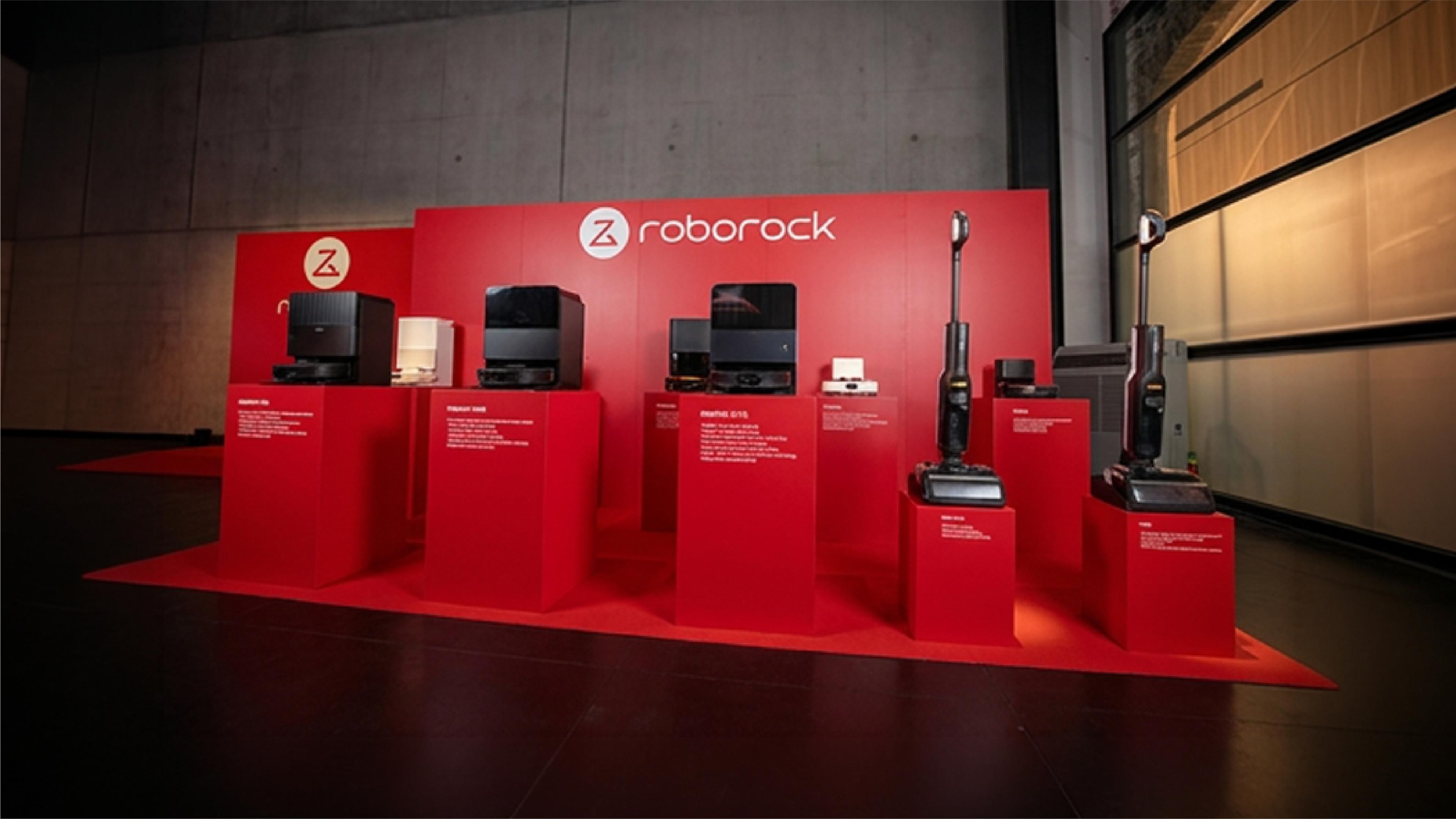 Roborock logo alongside robotic vacuum cleaners