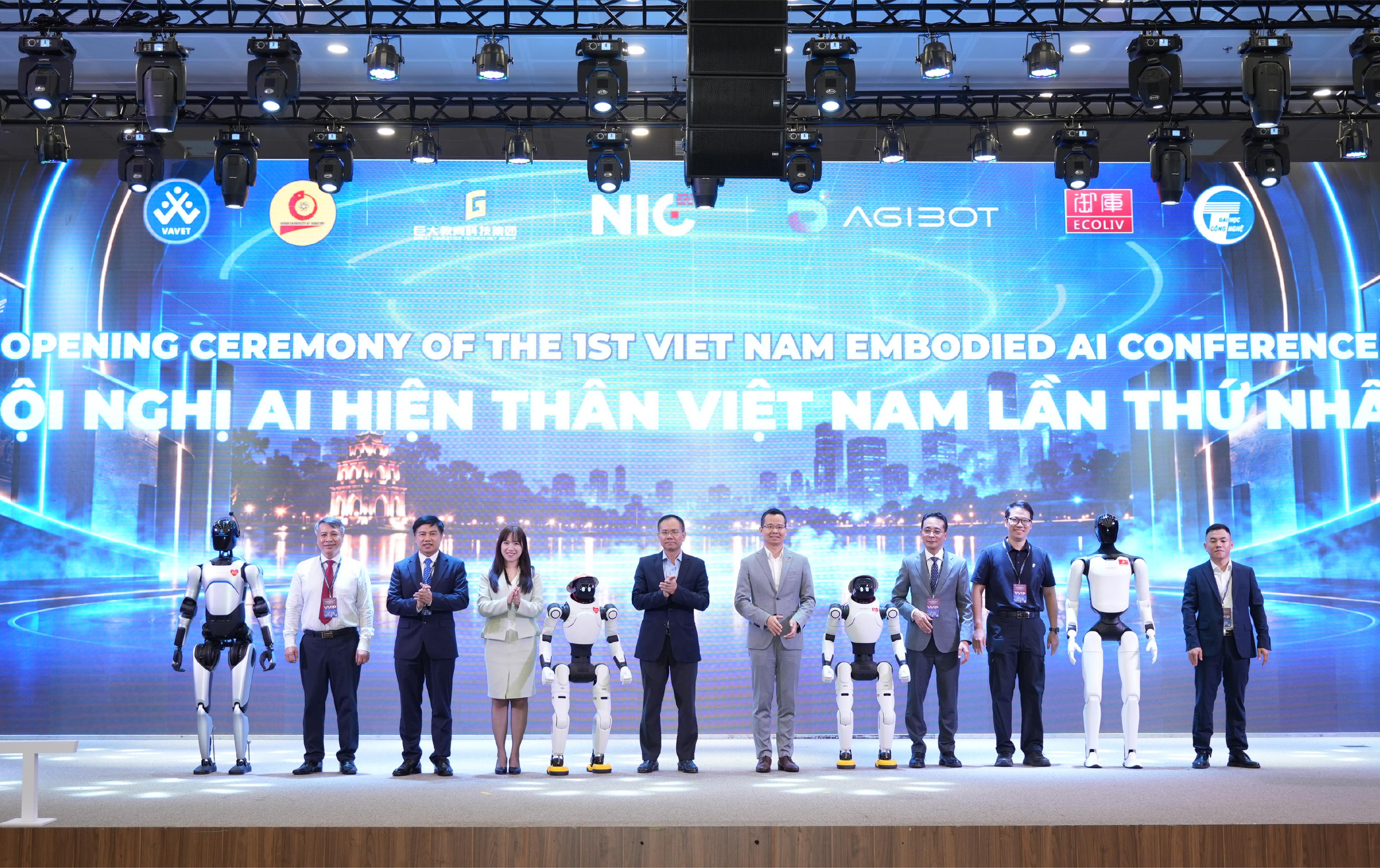 AGIBOT humanoid robots join officials and organizers onstage at the opening ceremony of the first Vietnam Embodied AI Conference in Hanoi.