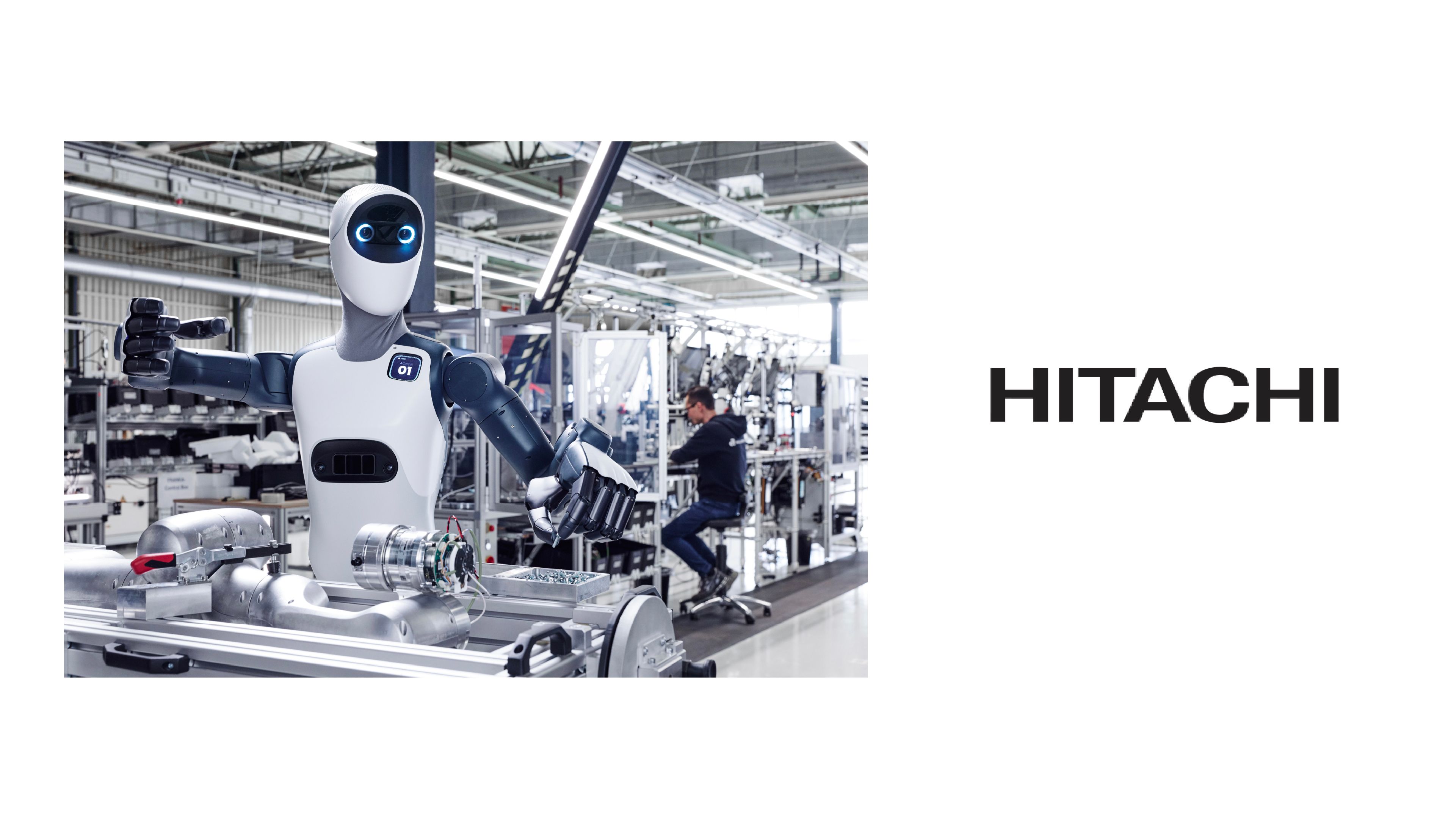 Agile ONE humanoid robot works at a manufacturing station in a factory, alongside the Hitachi logo.