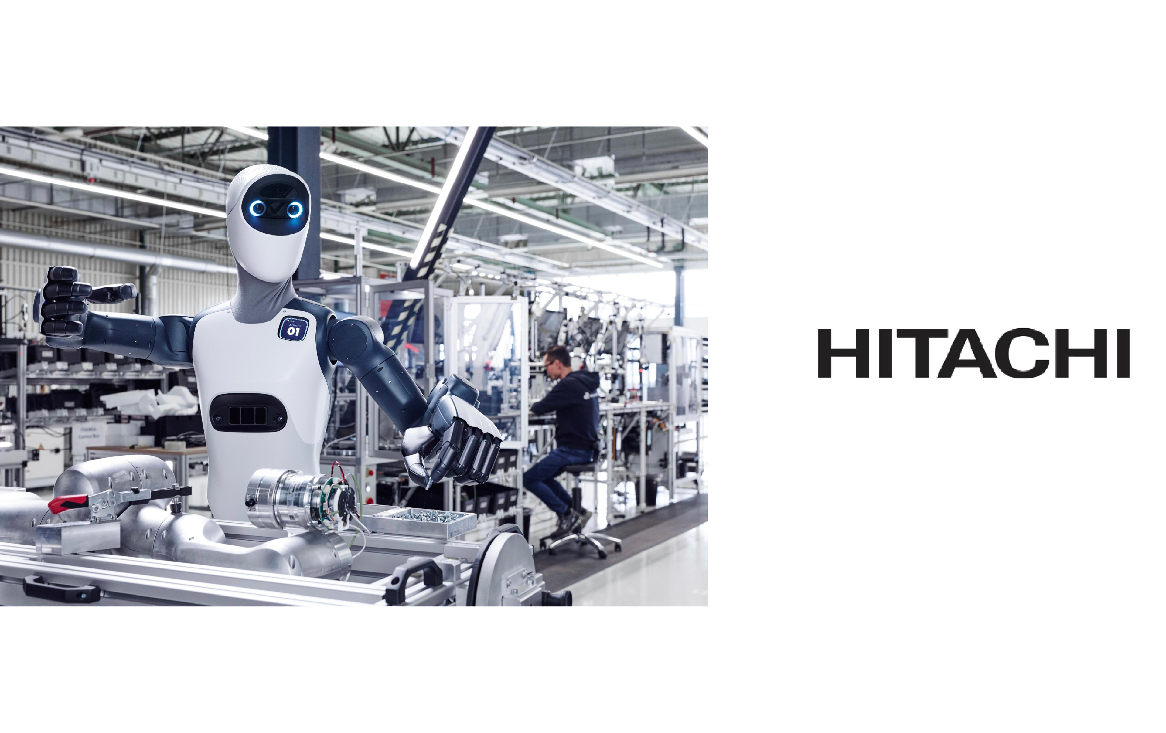 Agile ONE humanoid robot works at a manufacturing station in a factory, alongside the Hitachi logo.