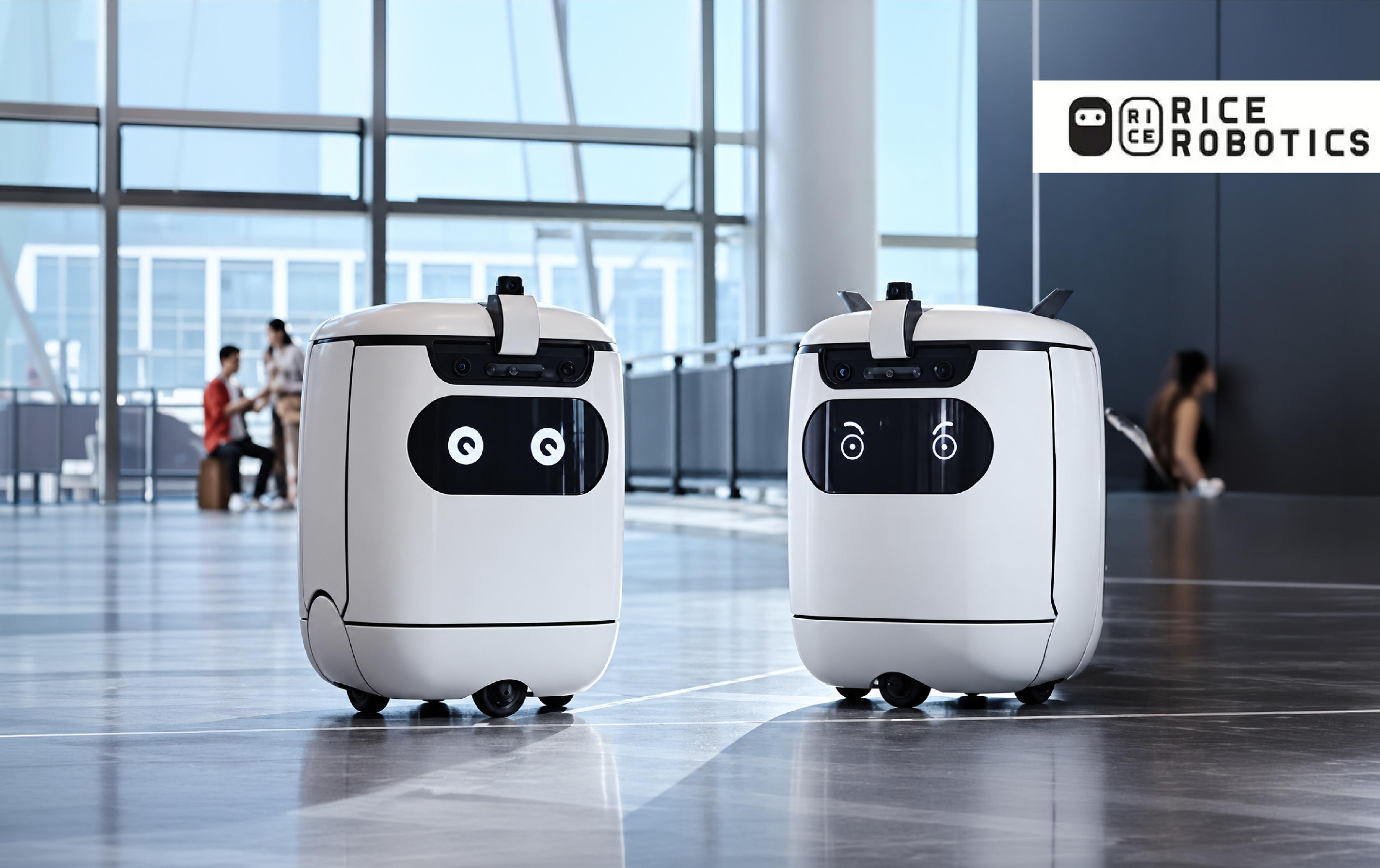 Two Rice Robotics service robots with digital facial expressions, front-mounted cameras and wheeled bases.