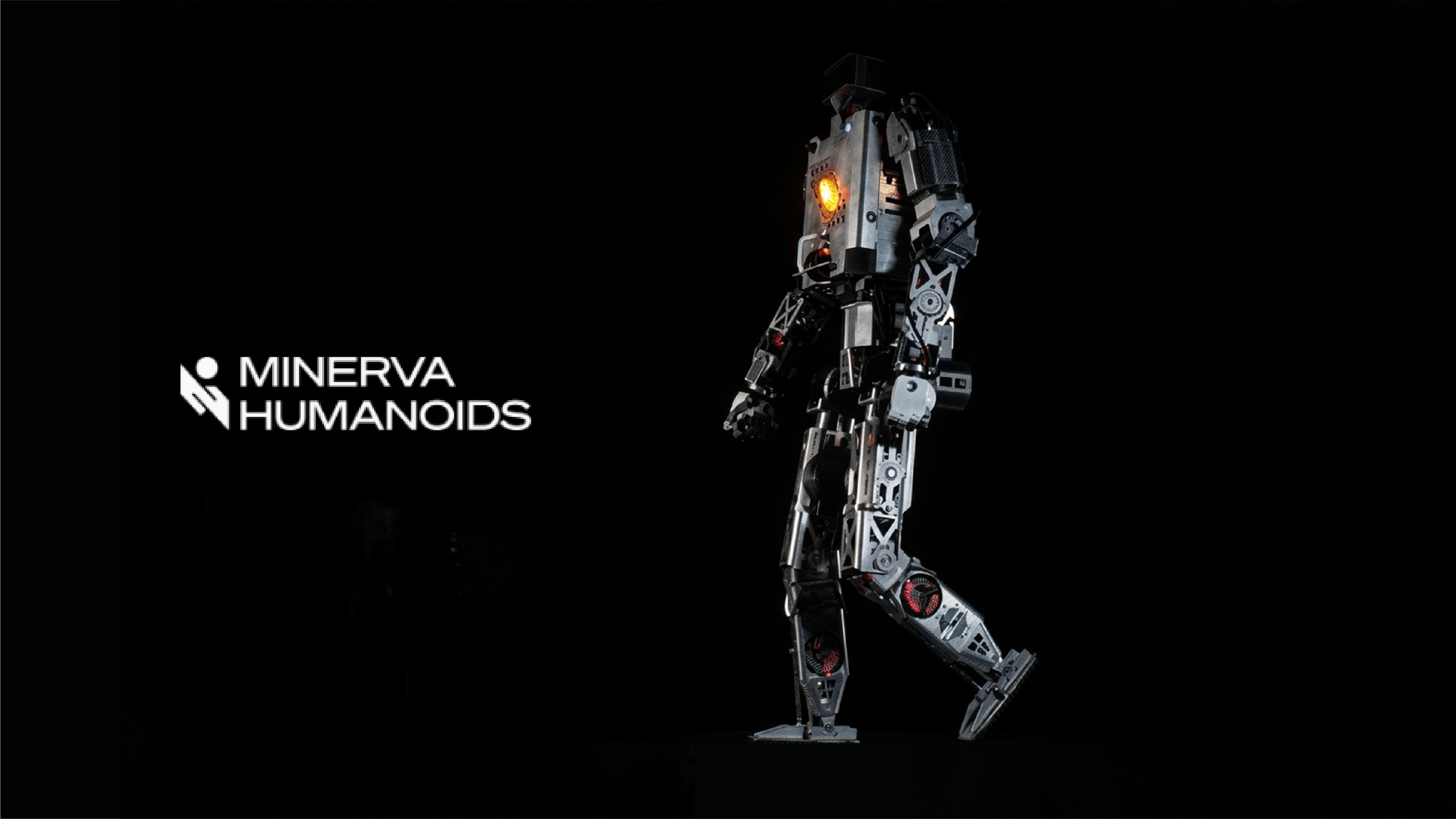 Minerva Humanoids' humanoid robot Roger, shown in a walking pose with exposed mechanical components and an illuminated chest panel against a black background.