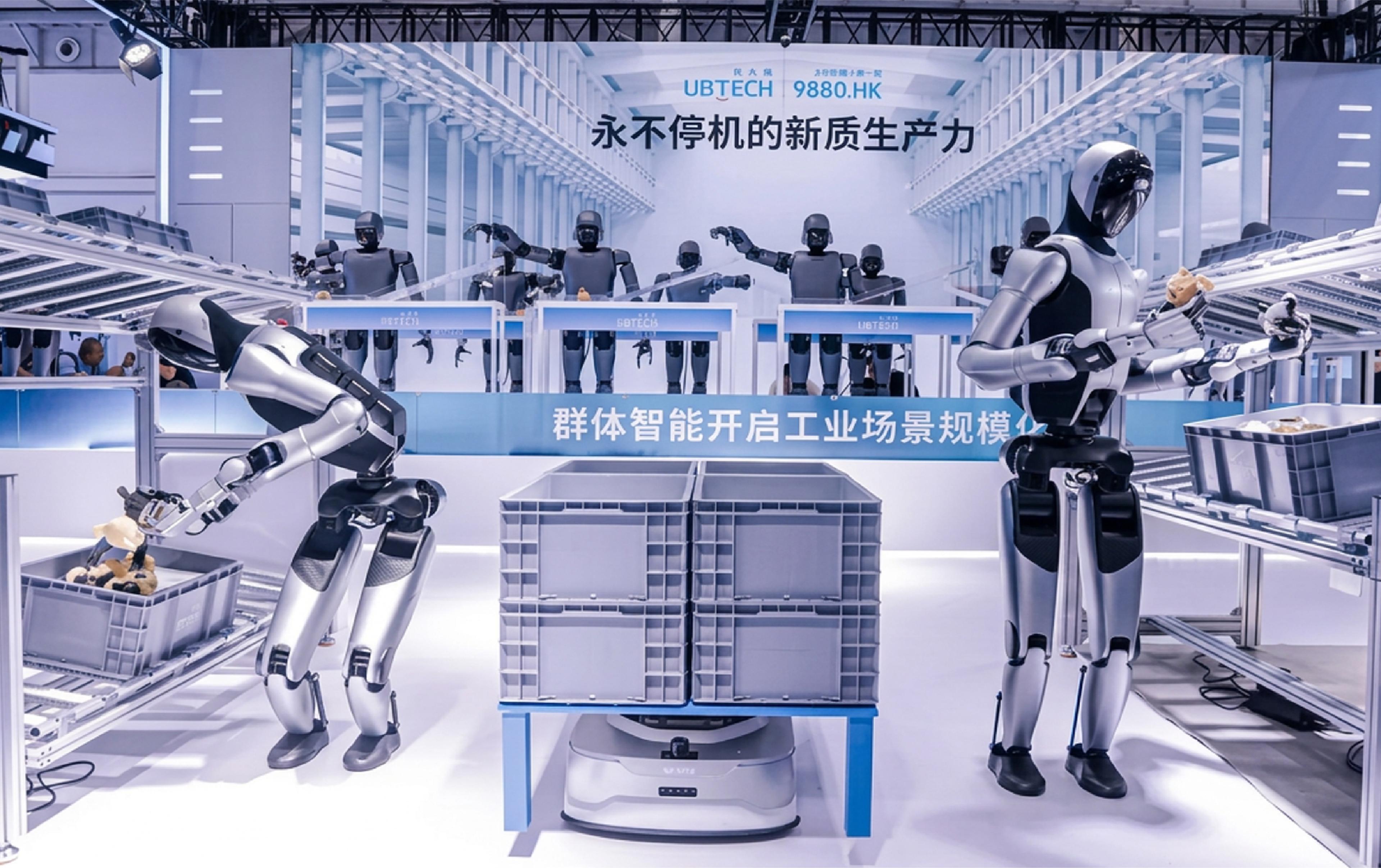 UBTECH robots handle objects beside conveyor systems in a factory demonstration.
