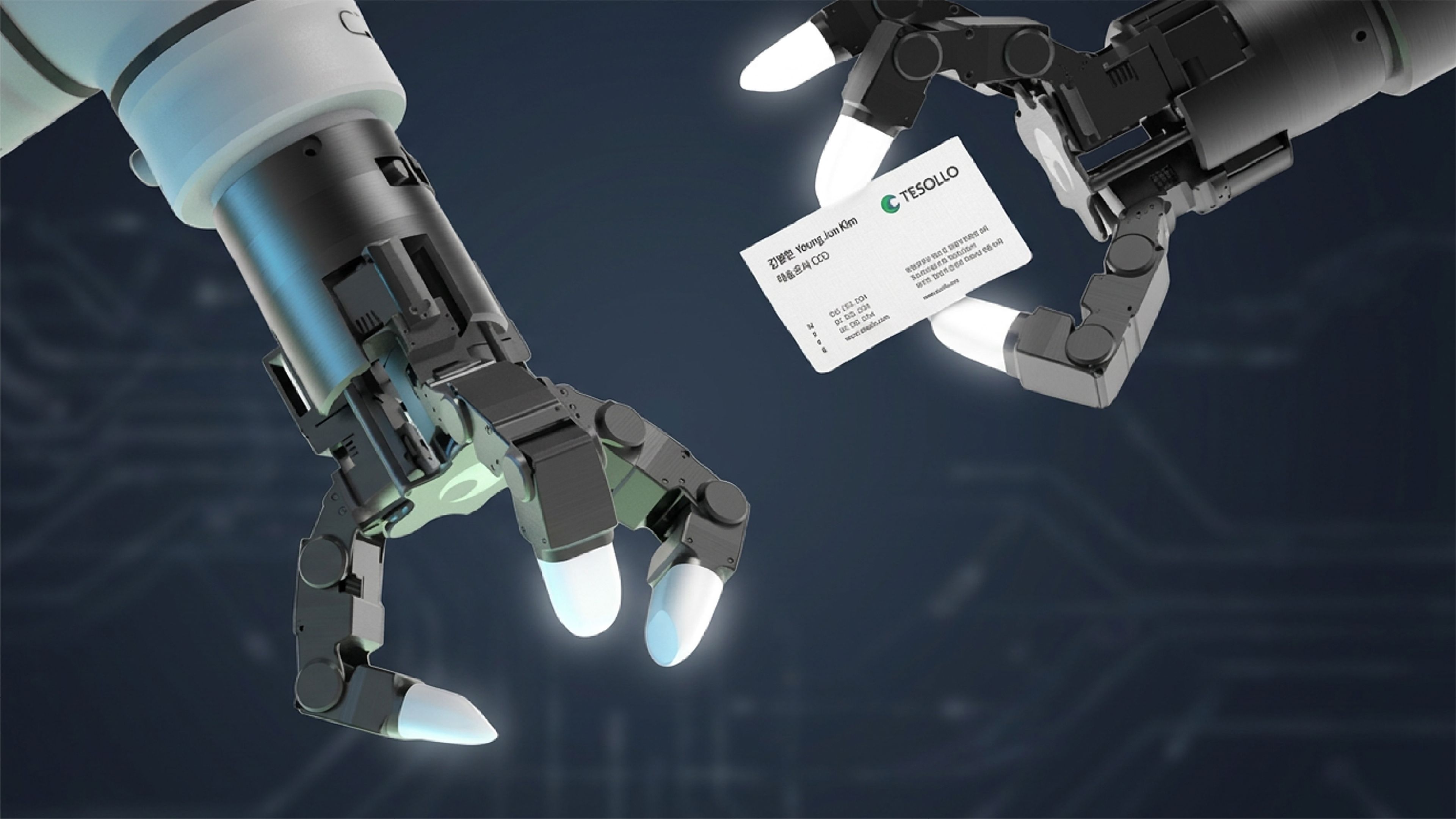 Two Tesollo robotic hands, one holding a Tesollo business card.