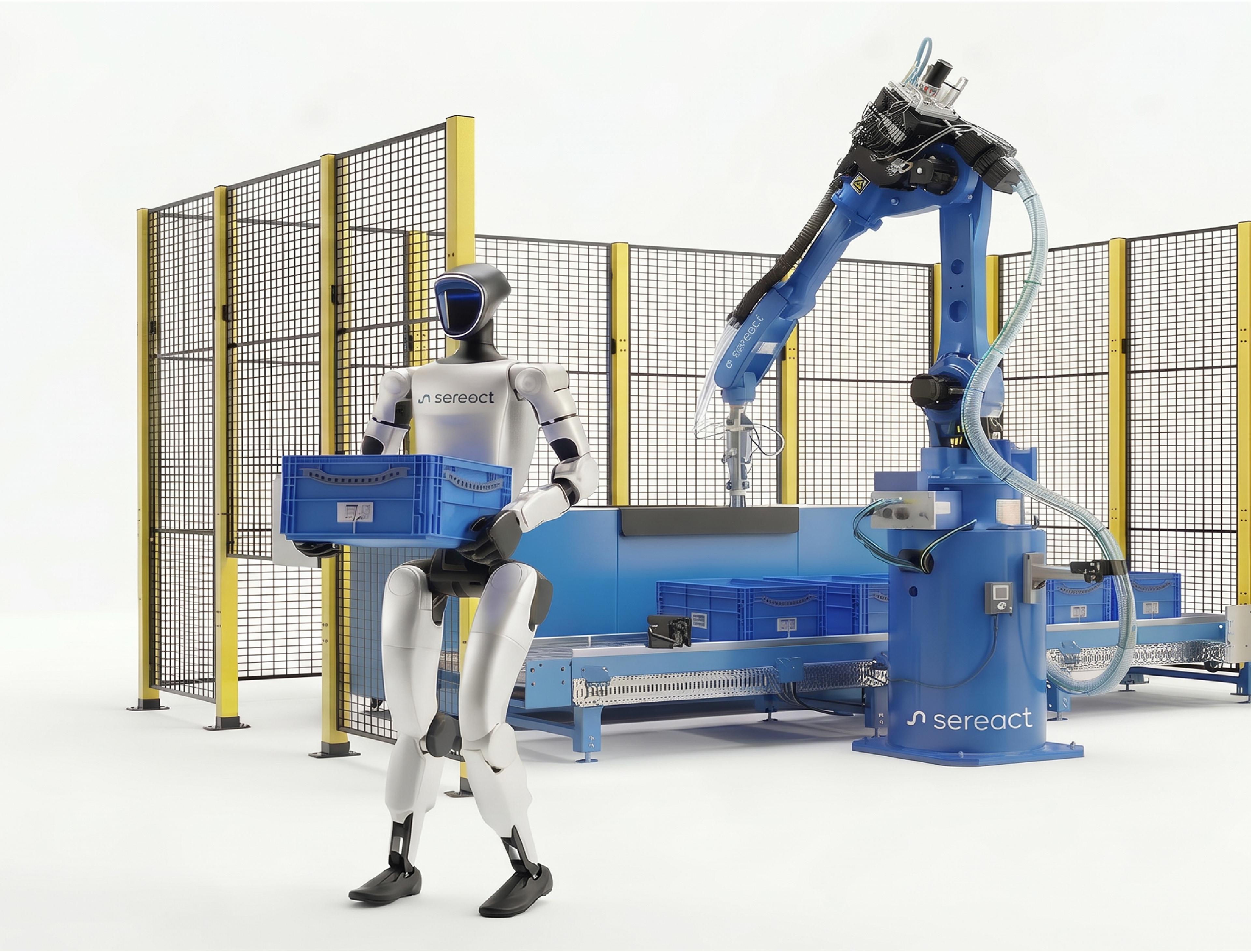 Sereact-branded humanoid robot holds a blue storage bin beside an industrial robotic arm and conveyor system in a cell.