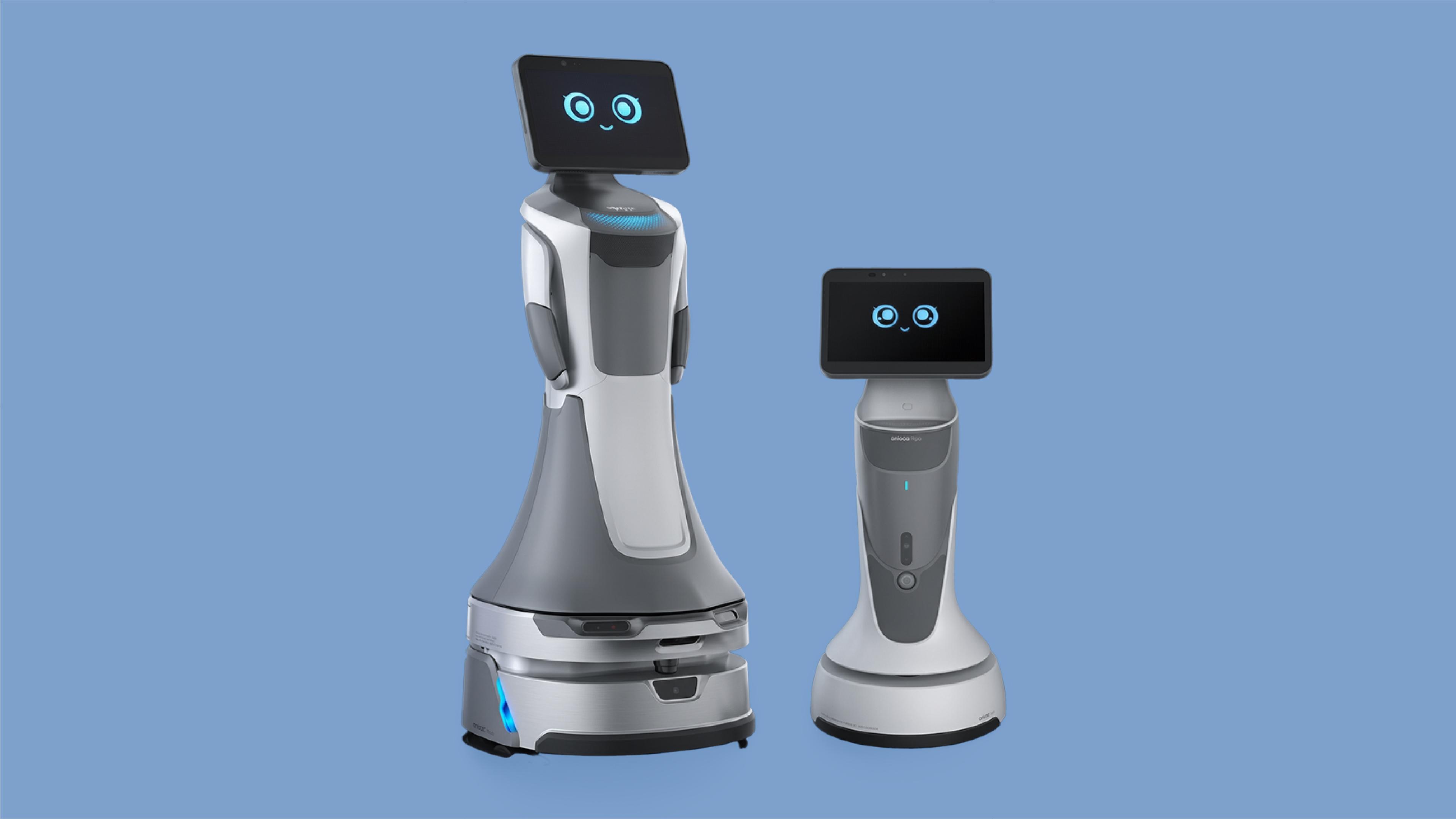 Two wheeled passenger-service robots with animated faces displayed on screens against a blue background.