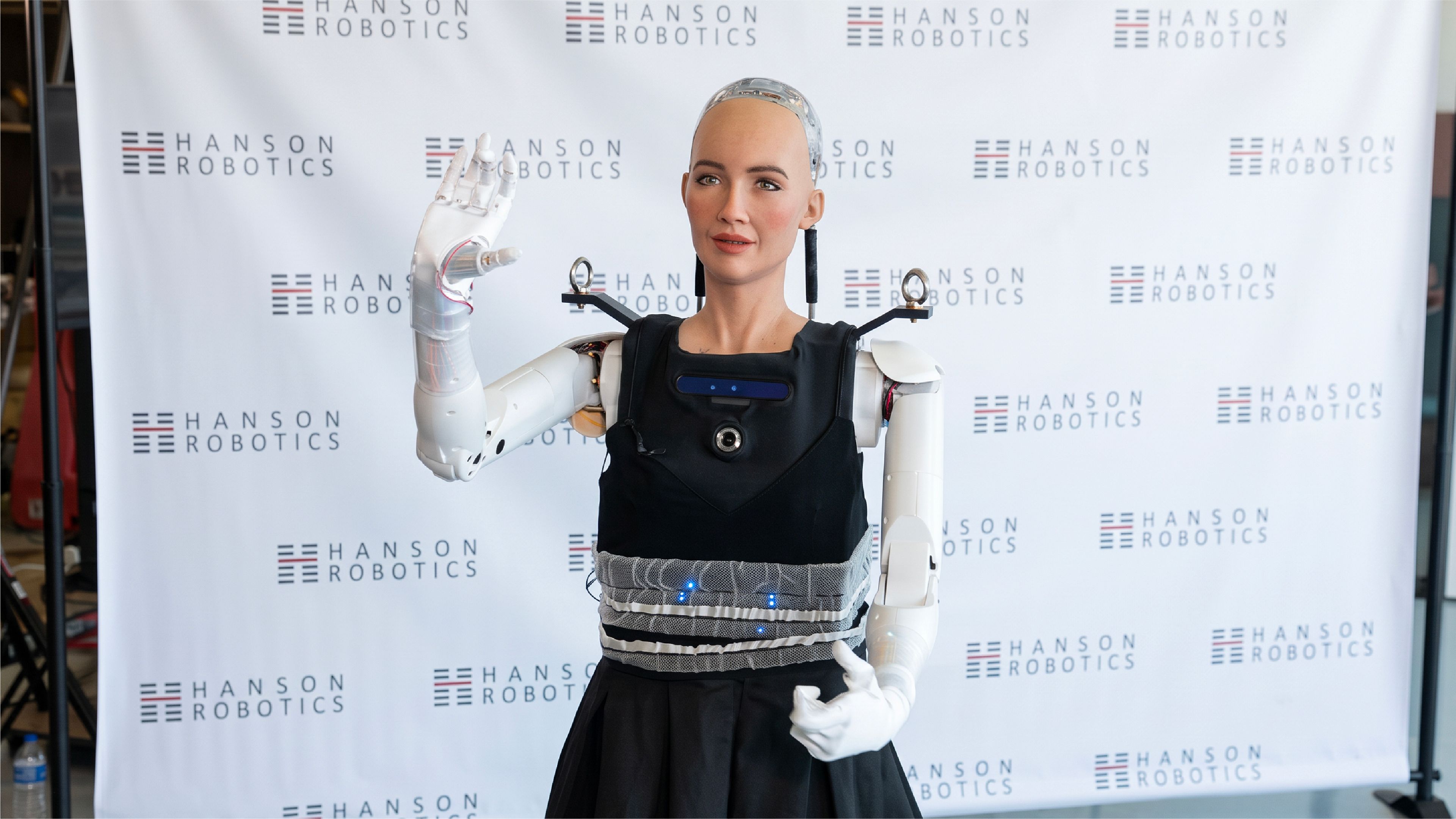 Hanson Robotics’ Sophia humanoid robot raises one hand