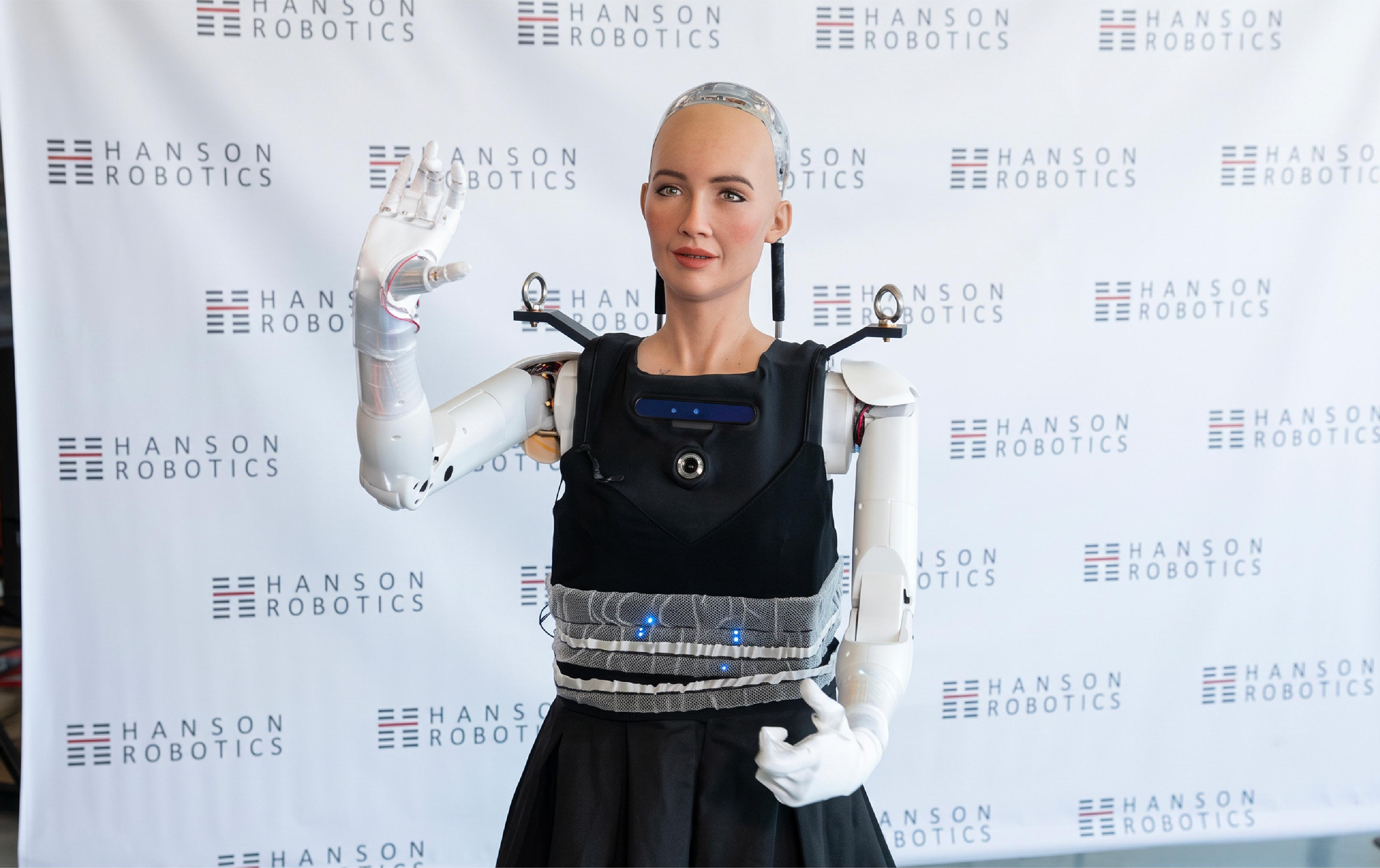 Hanson Robotics’ Sophia humanoid robot raises one hand