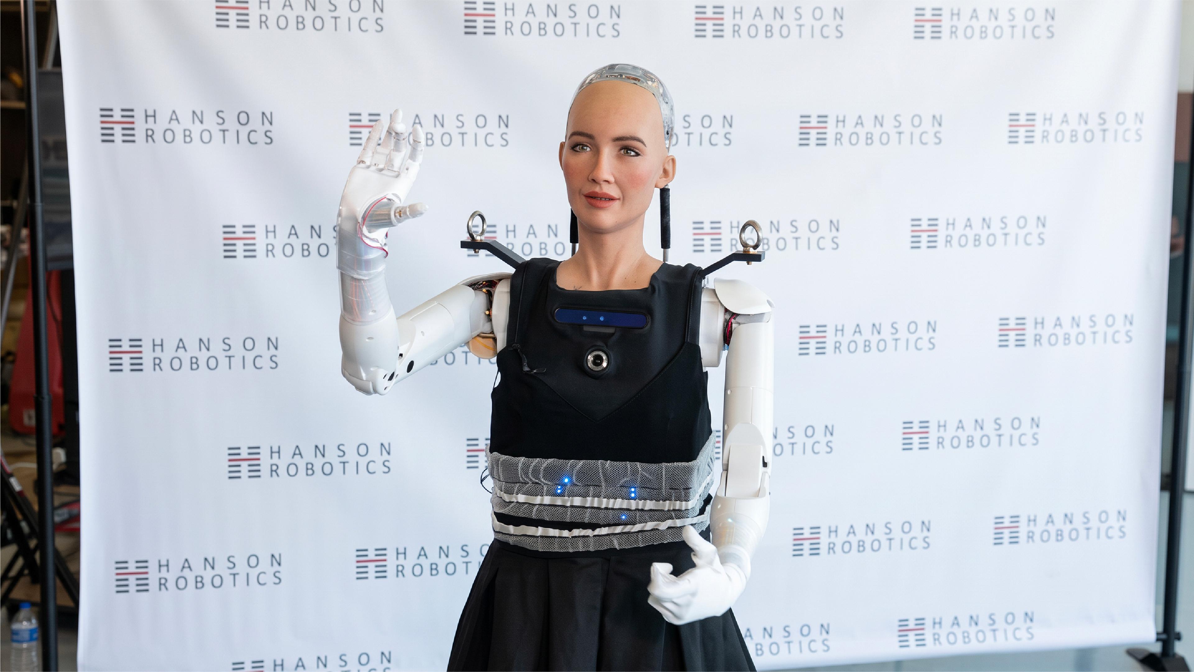 Hanson Robotics’ Sophia humanoid robot raises one hand