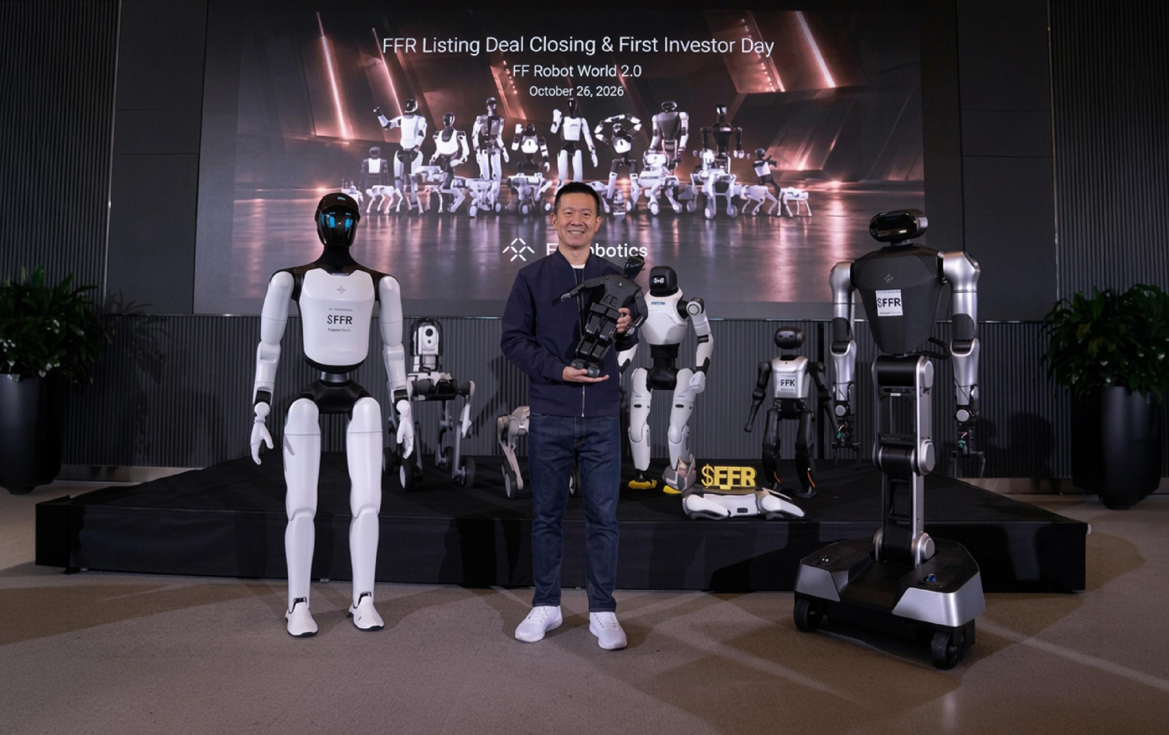 YT Jia, CEO of Faraday Future and FFR, poses with several humanoid and wheeled robots at FFR's listing deal closing and investor day event on Oct. 26, 2026.