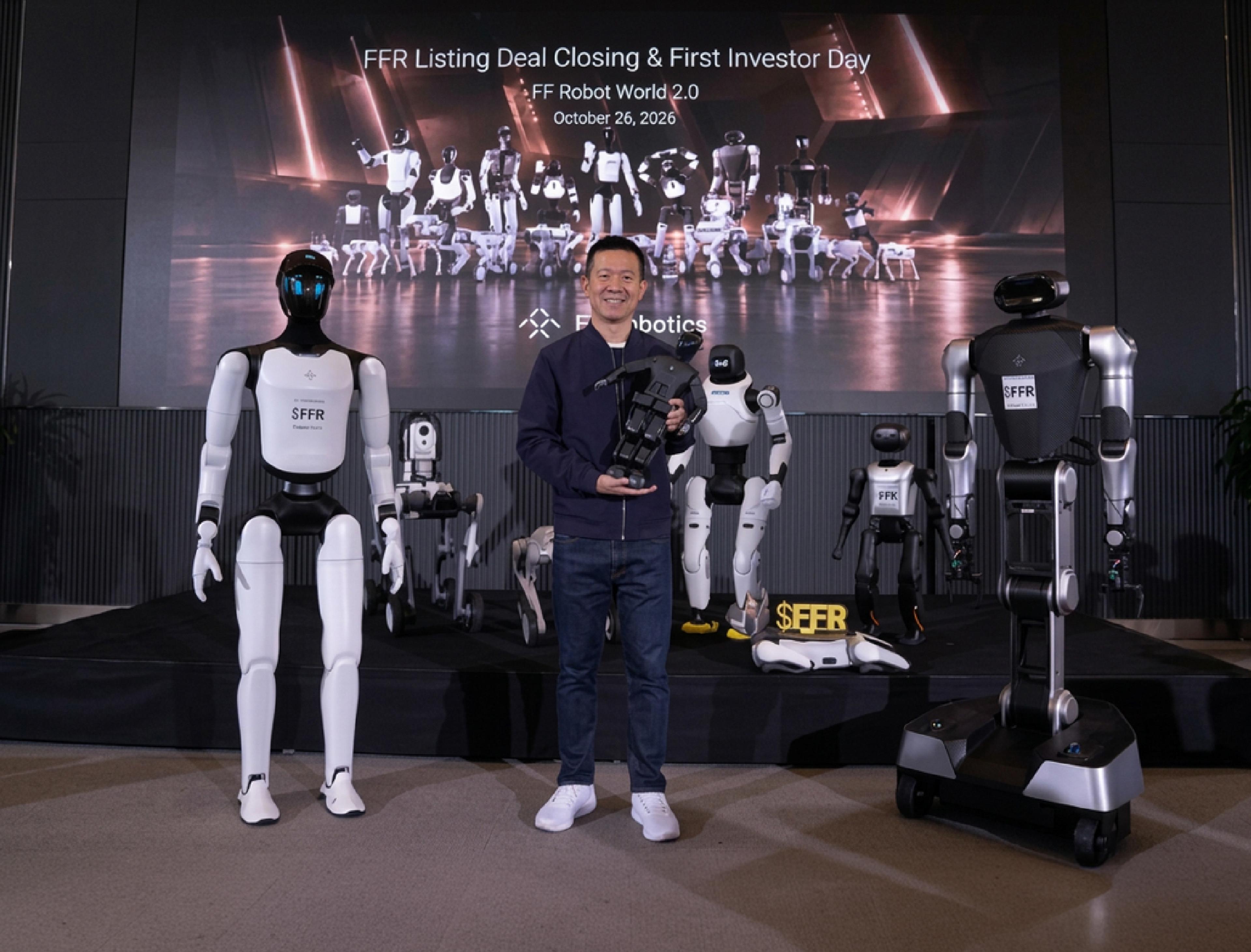 YT Jia, CEO of Faraday Future and FFR, poses with several humanoid and wheeled robots at FFR's listing deal closing and investor day event on Oct. 26, 2026.