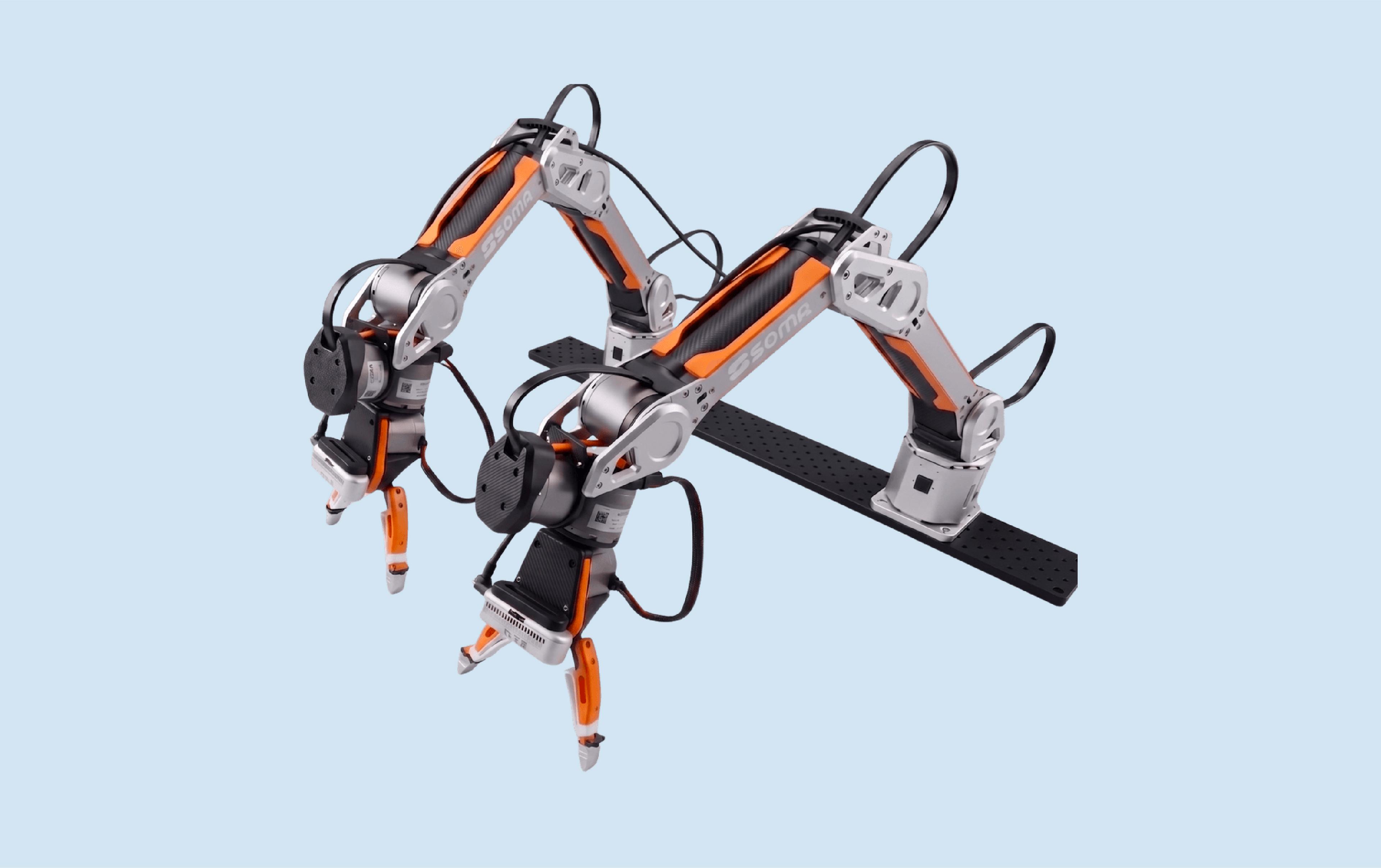 SOMA Robotics’ soma one desktop research robot with two articulated arms and grippers mounted on a fixed tabletop frame.