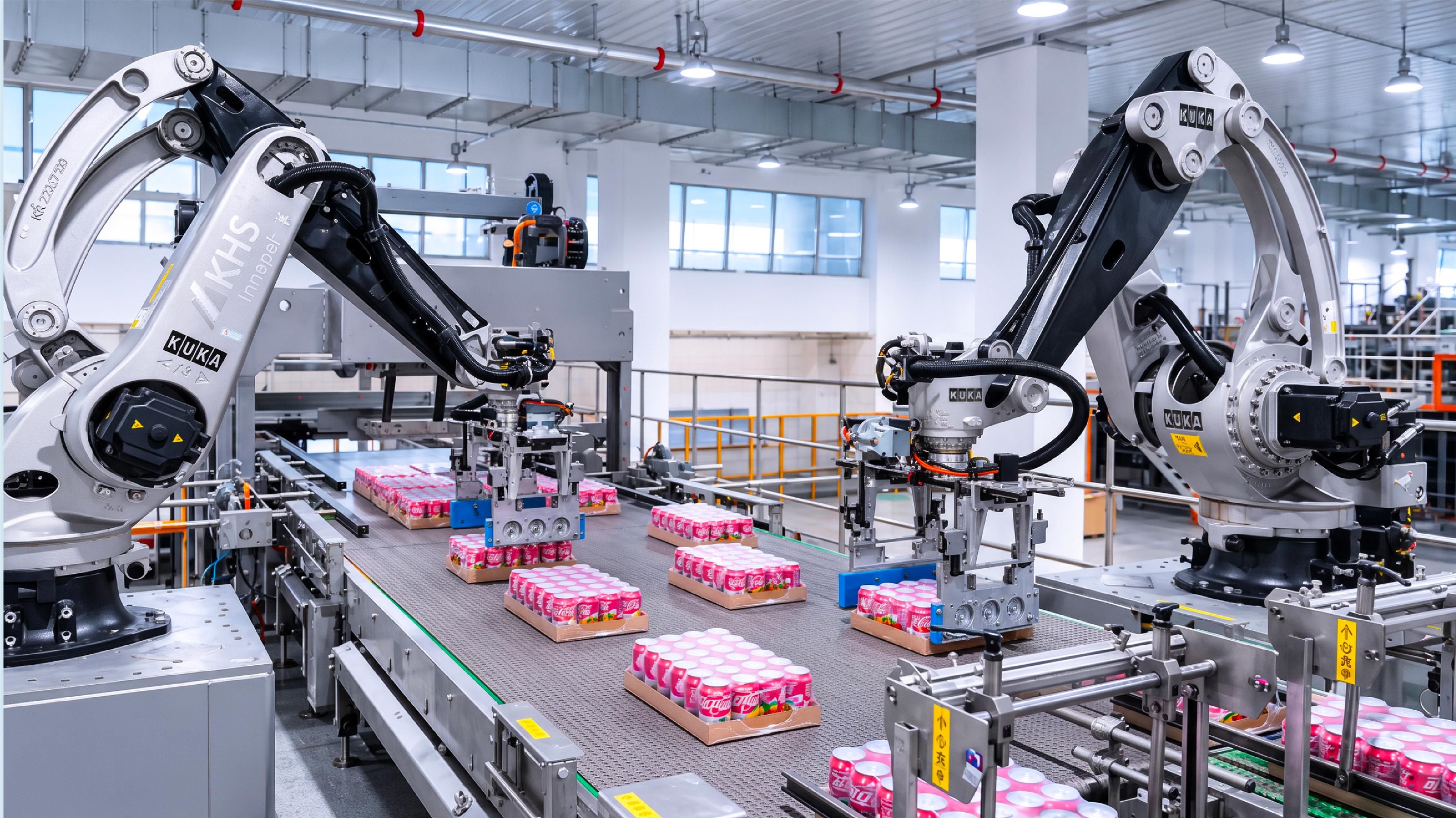 Swire Coca-Cola deploys AI-controlled picking robots at its Zhengzhou factory to handle heavy, shrink-wrapped beverage products.