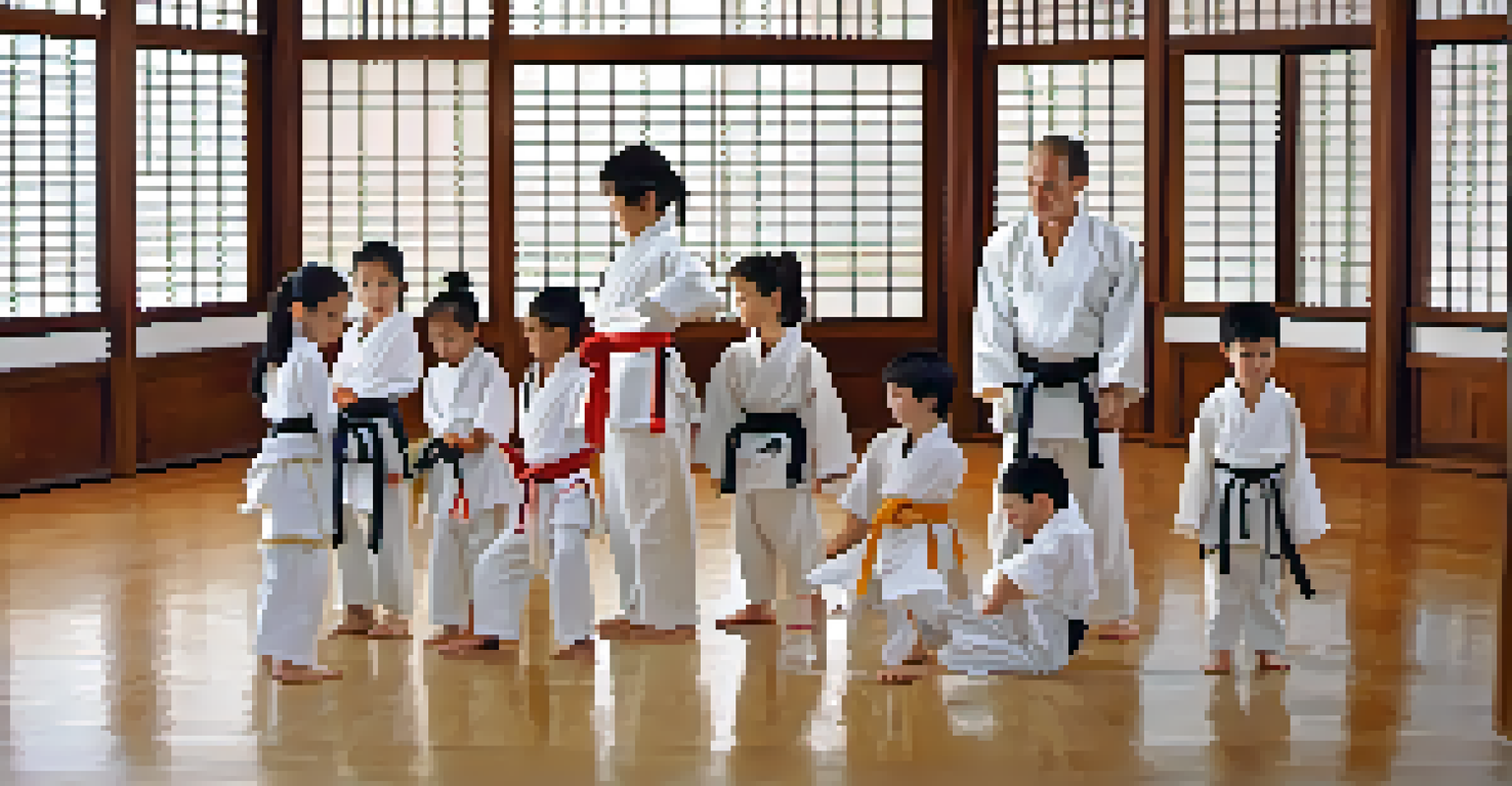 A group of children in martial arts uniforms bowing to their instructor in a dojo.