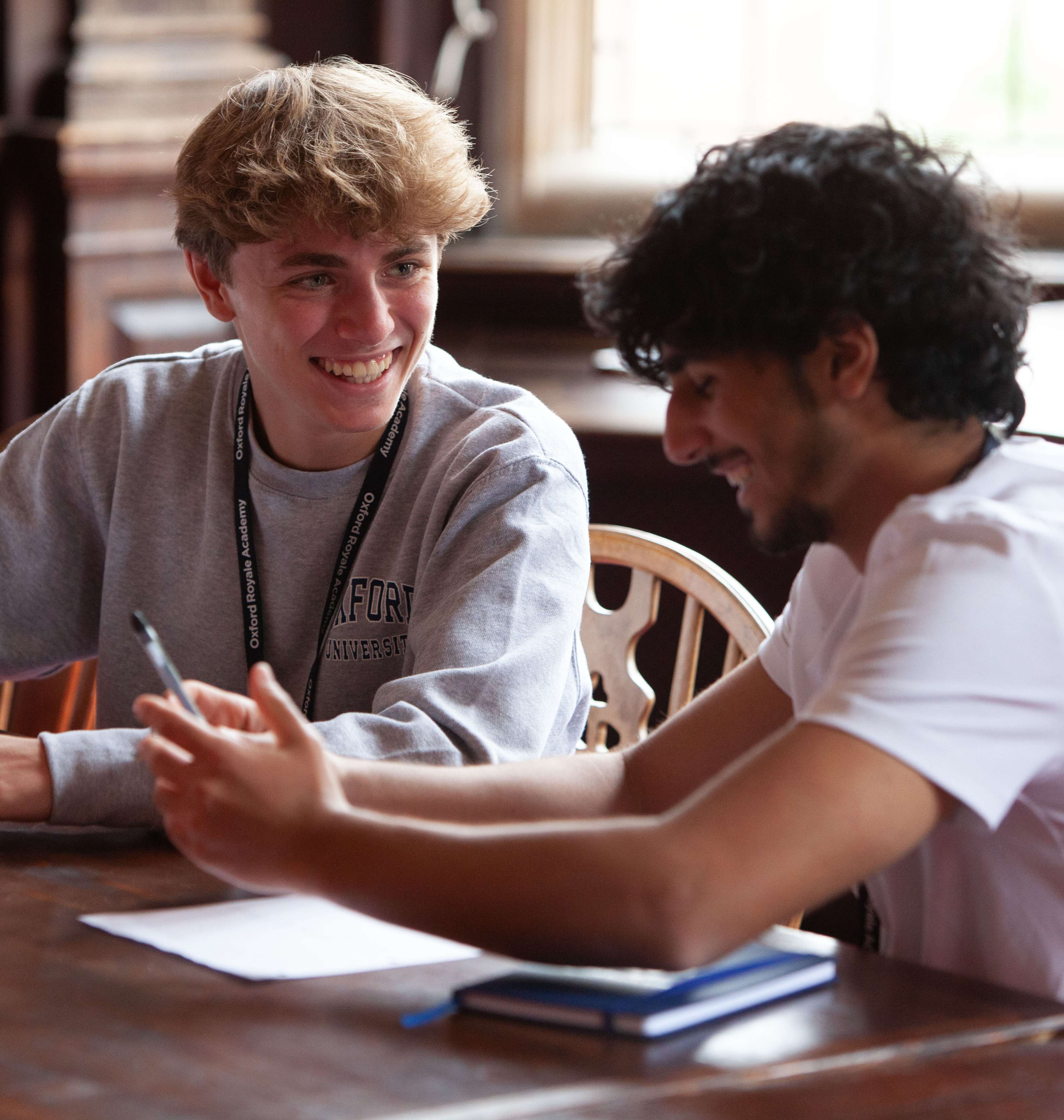 Oxford Royale students reviewing business plans in Cambridge