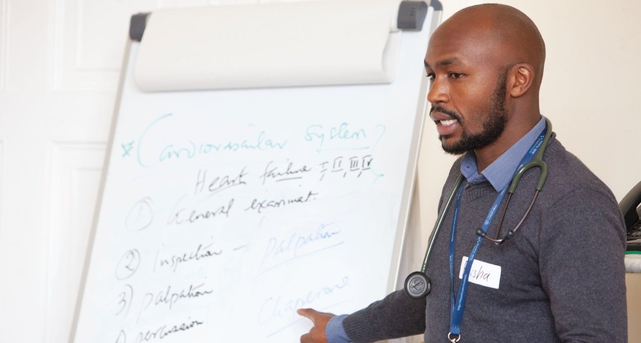 Teacher speaking to a class