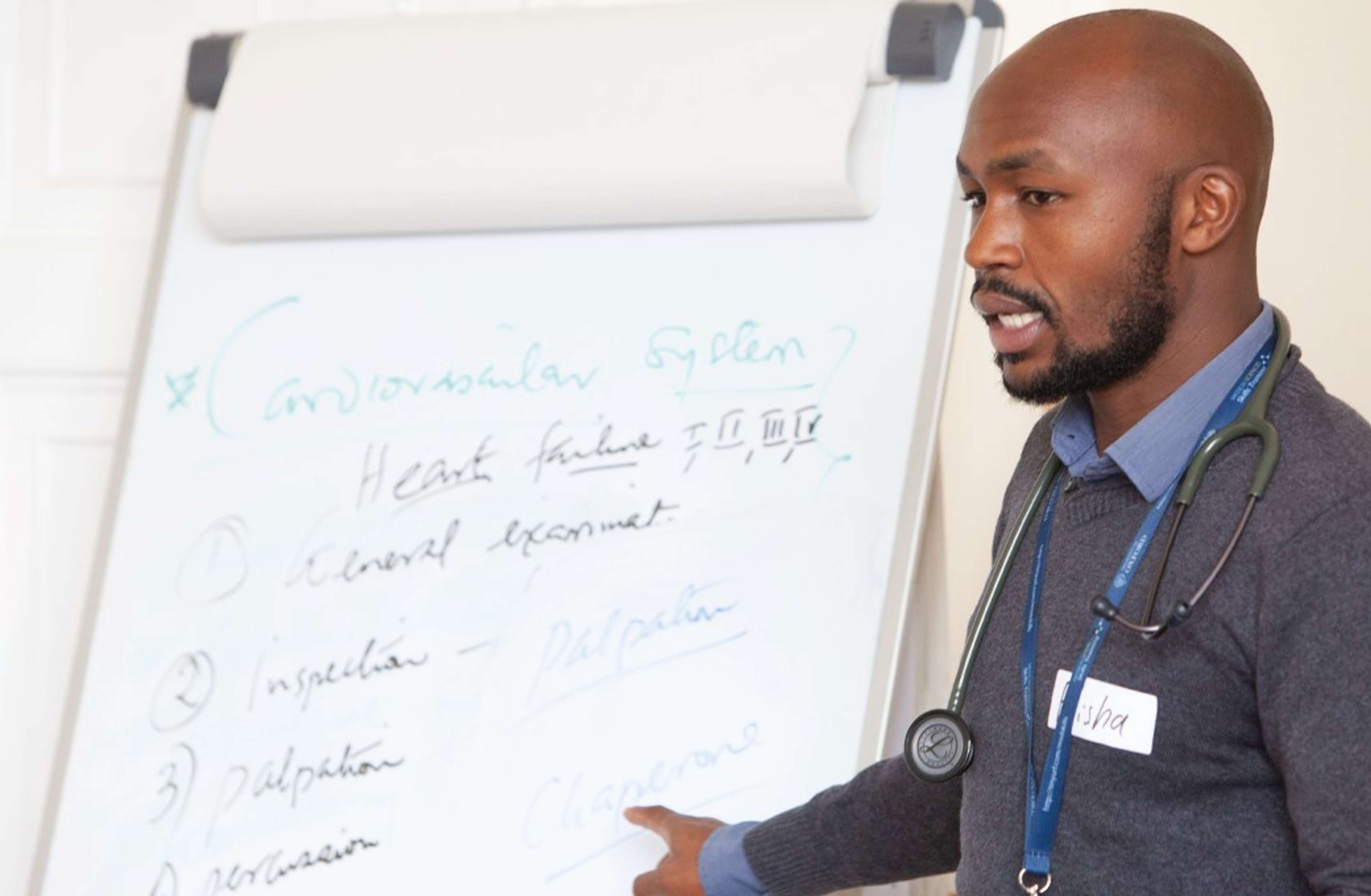 Teacher speaking to a class