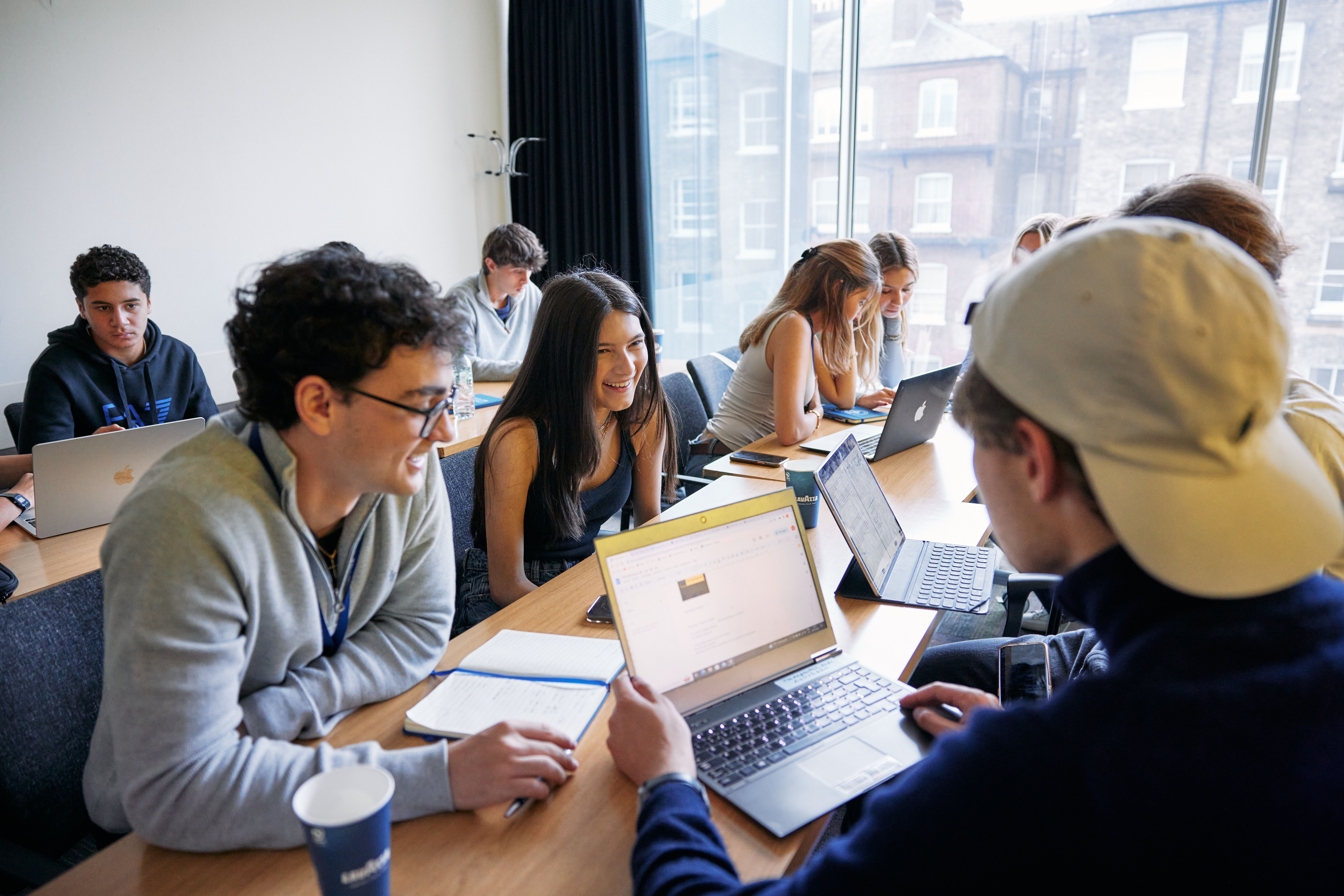 Oxford Royale students engaging in a class in a library