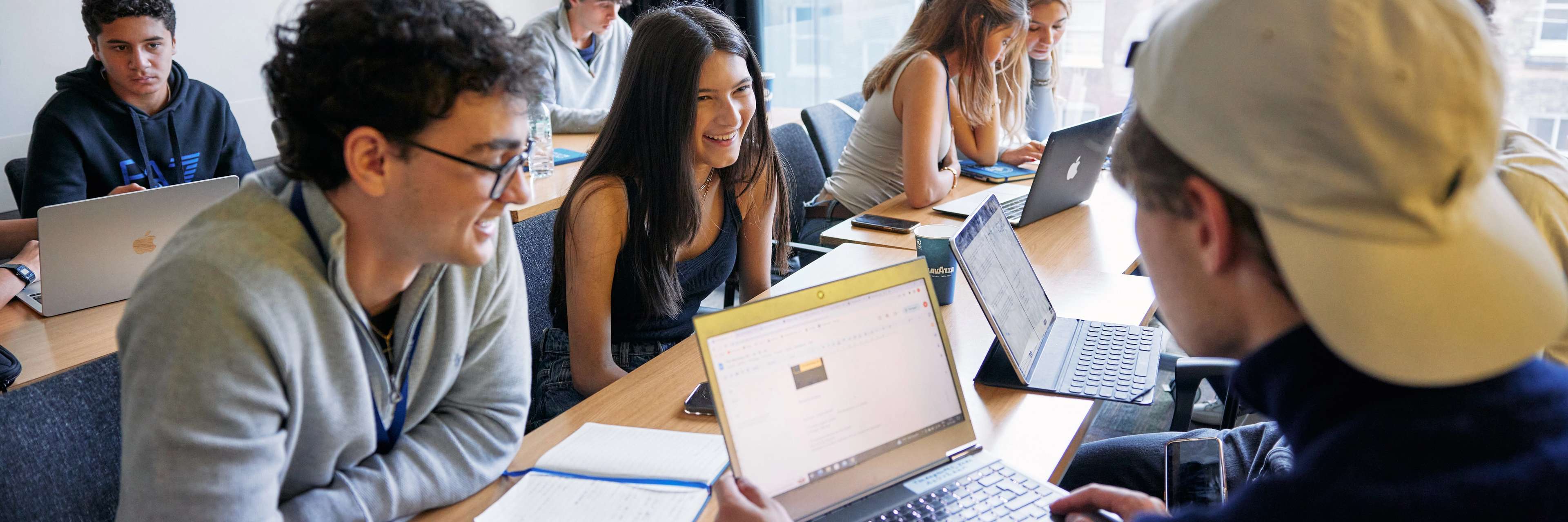 Oxford Royale students engaging in a class in a library