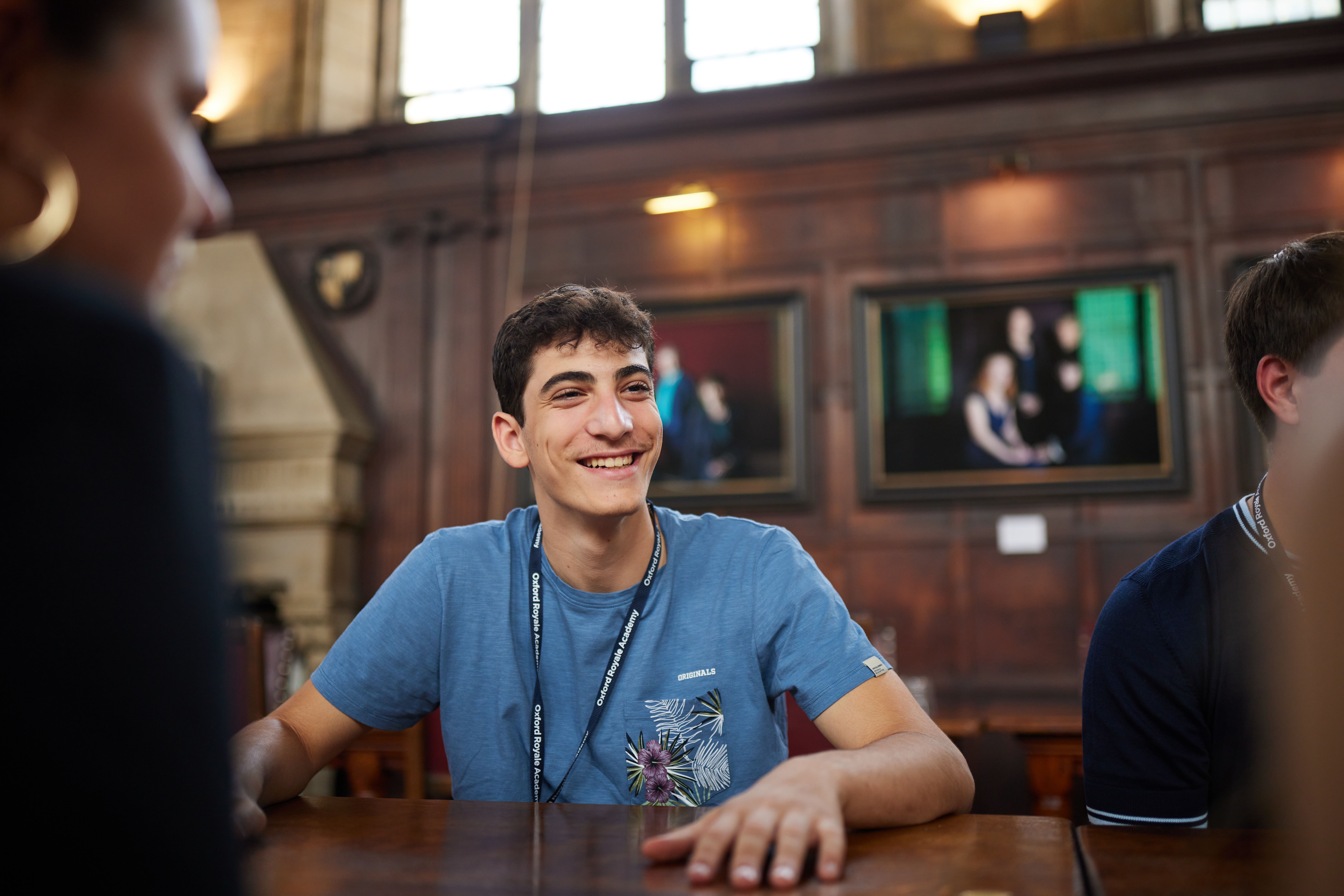 Oxford Royale students engaging in a class in a library