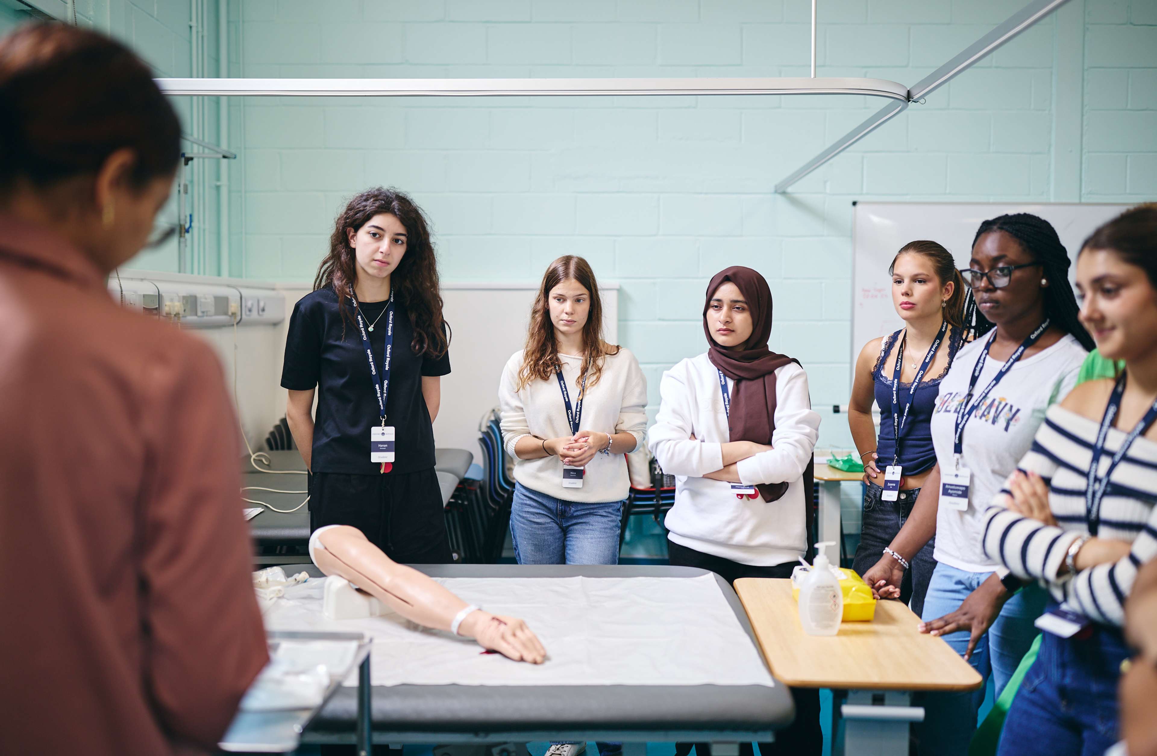 Teacher speaking to students
