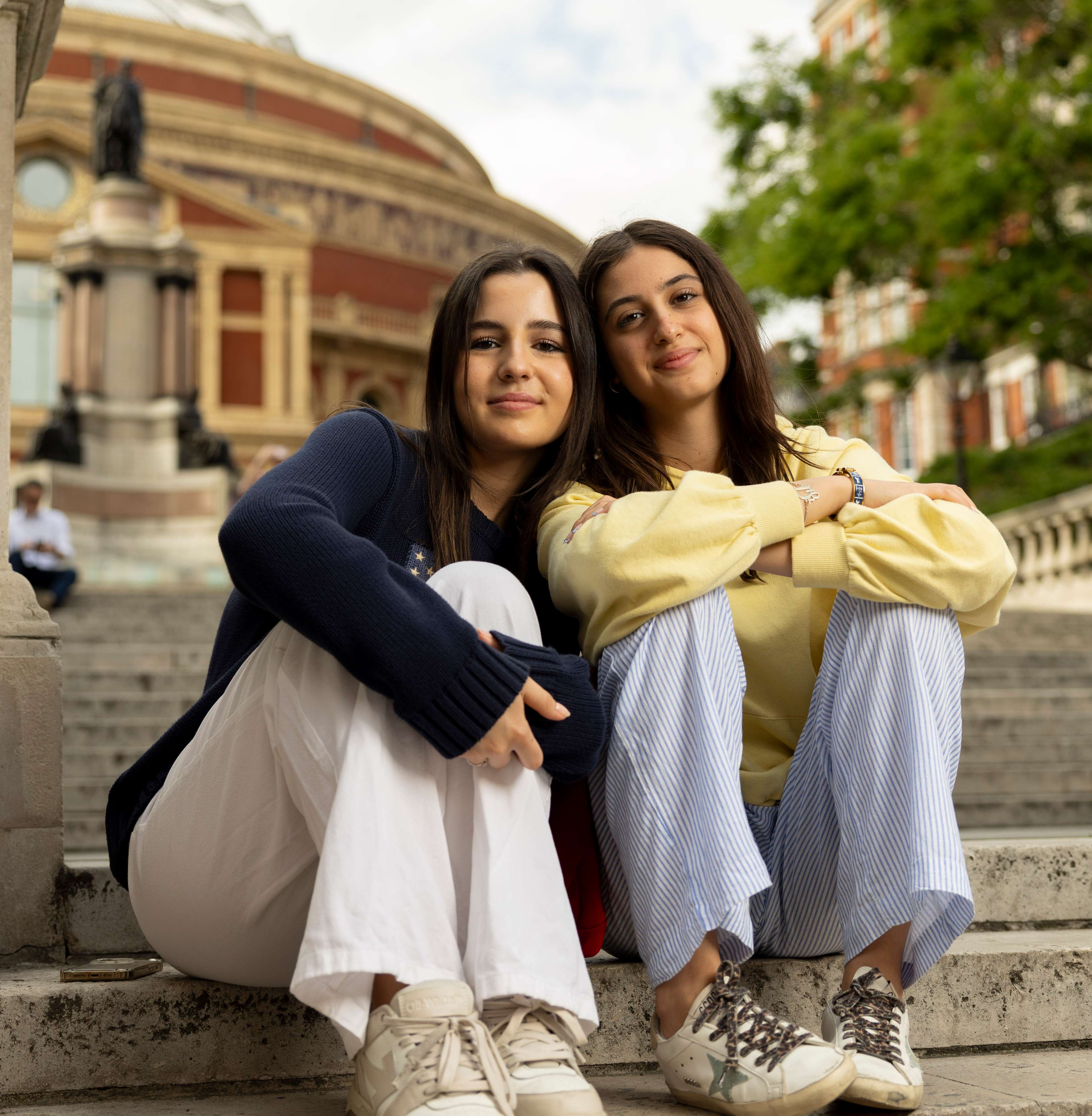 Two students smiling to camera