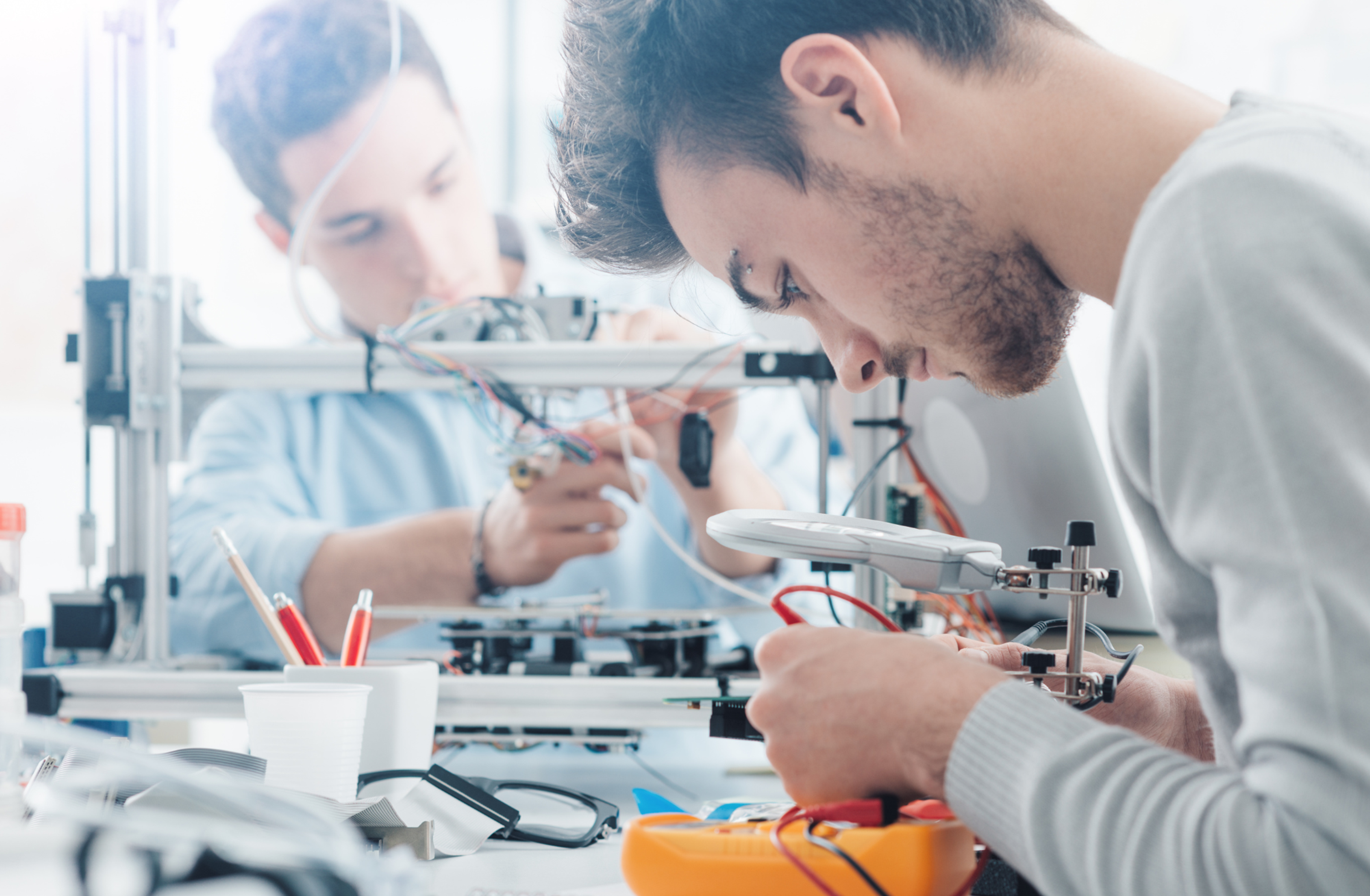Student building a robot