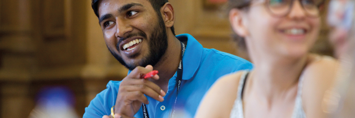 Smiling student in a classroom