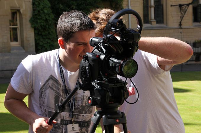 Oxford Royale film academy students using a large camera