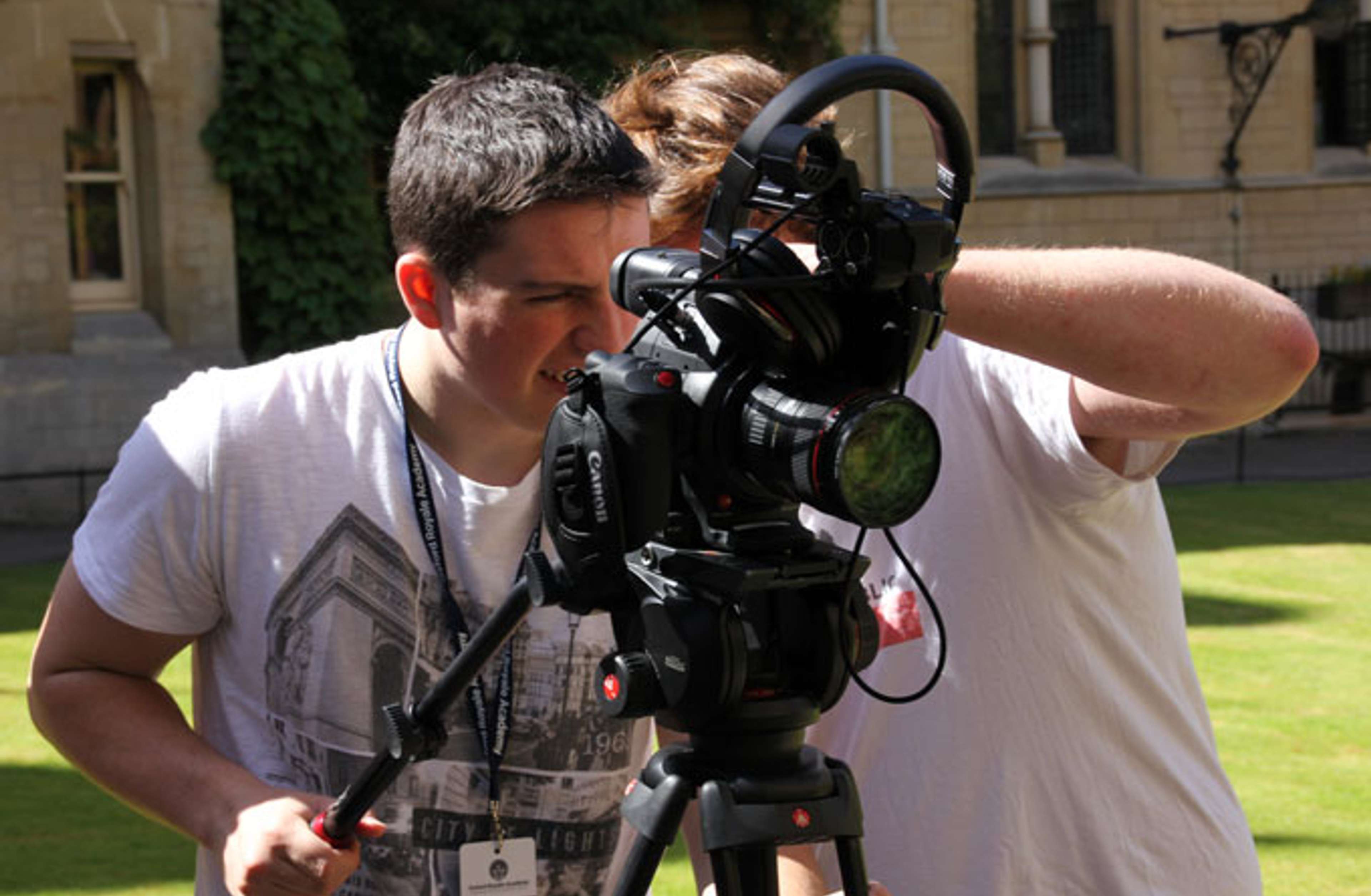 Person filming with a camera