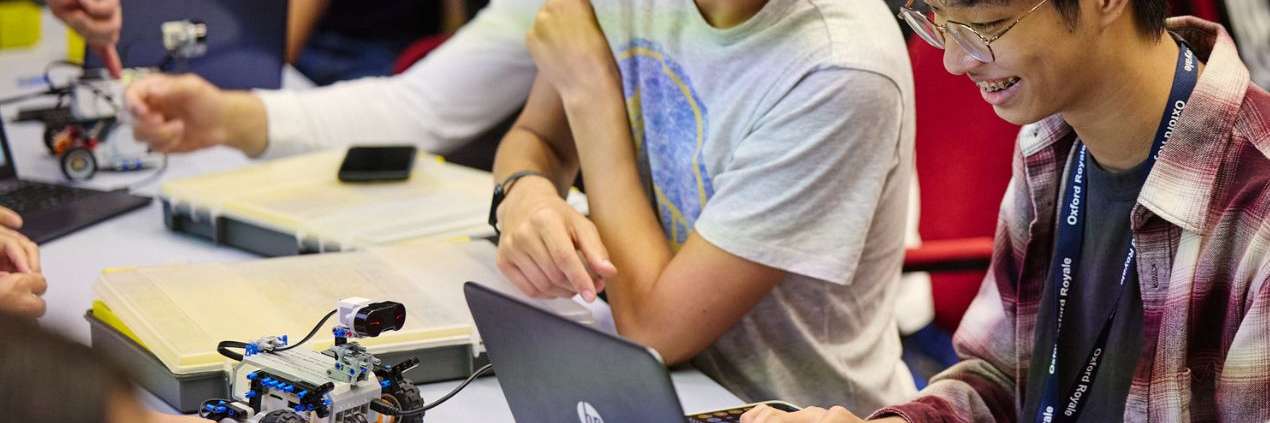 Oxford Royale students engaging in a class in a library