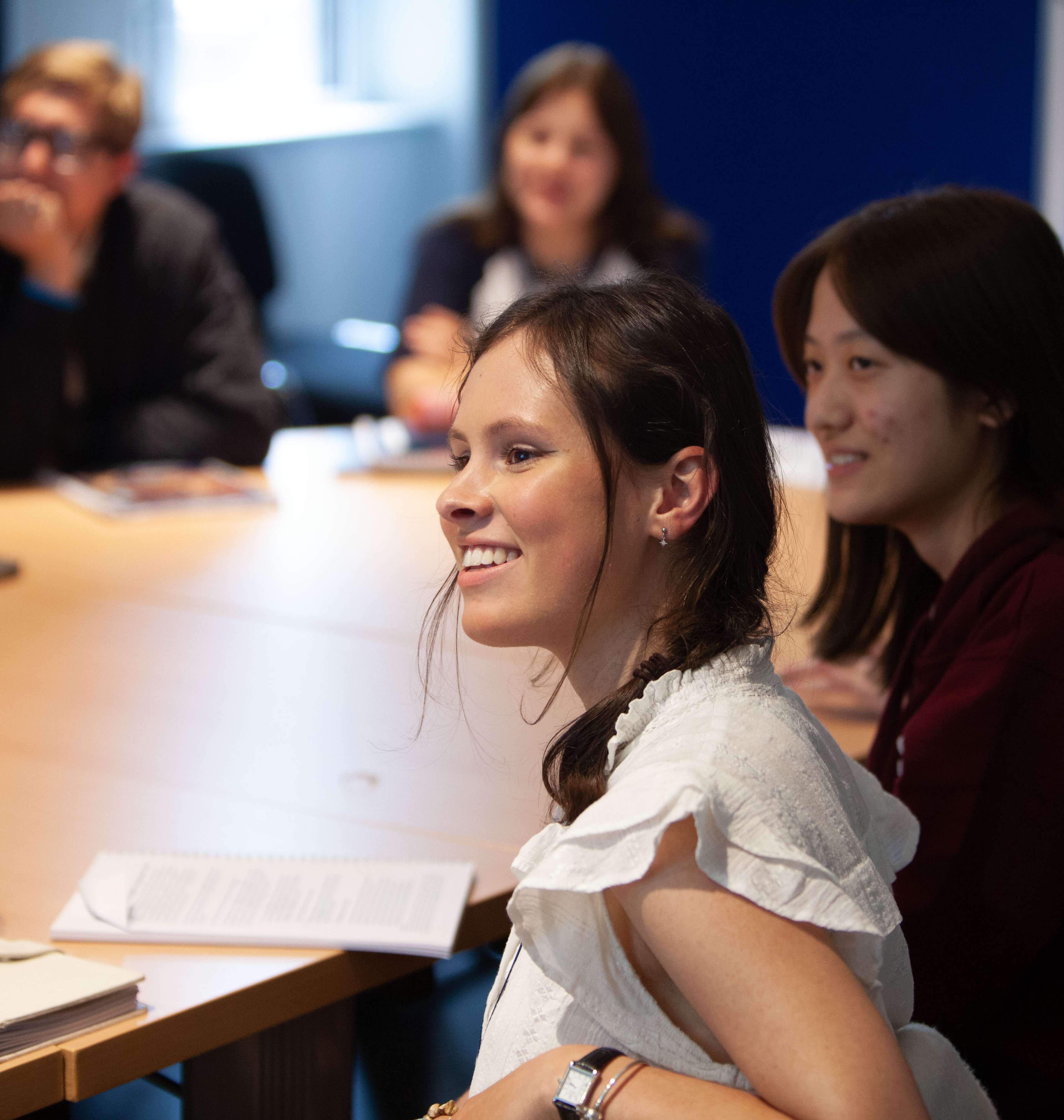 Oxford Royale students talking on the lawn